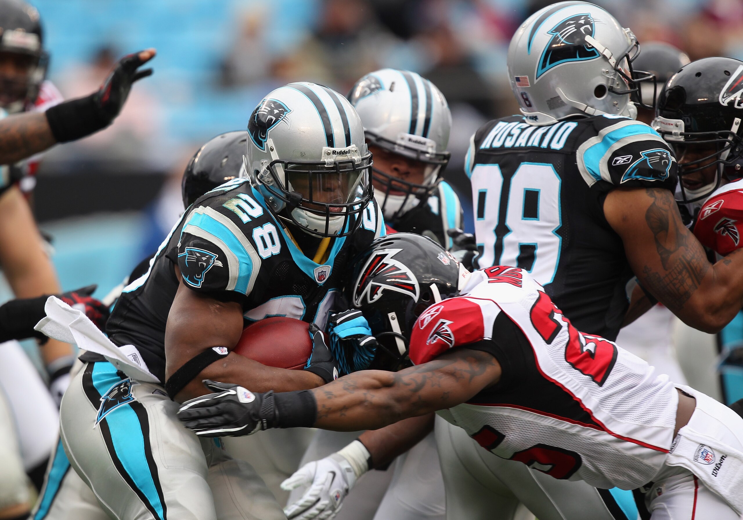 CHARLOTTE, NC - DECEMBER 12:  Jonathan Stewart #28 of the Carolina Panthers runs with the ball against the Atlanta Falcons during their game at Bank of America Stadium on December 12, 2010 in Charlotte, North Carolina.  (Photo by Streeter Lecka/Getty Imag