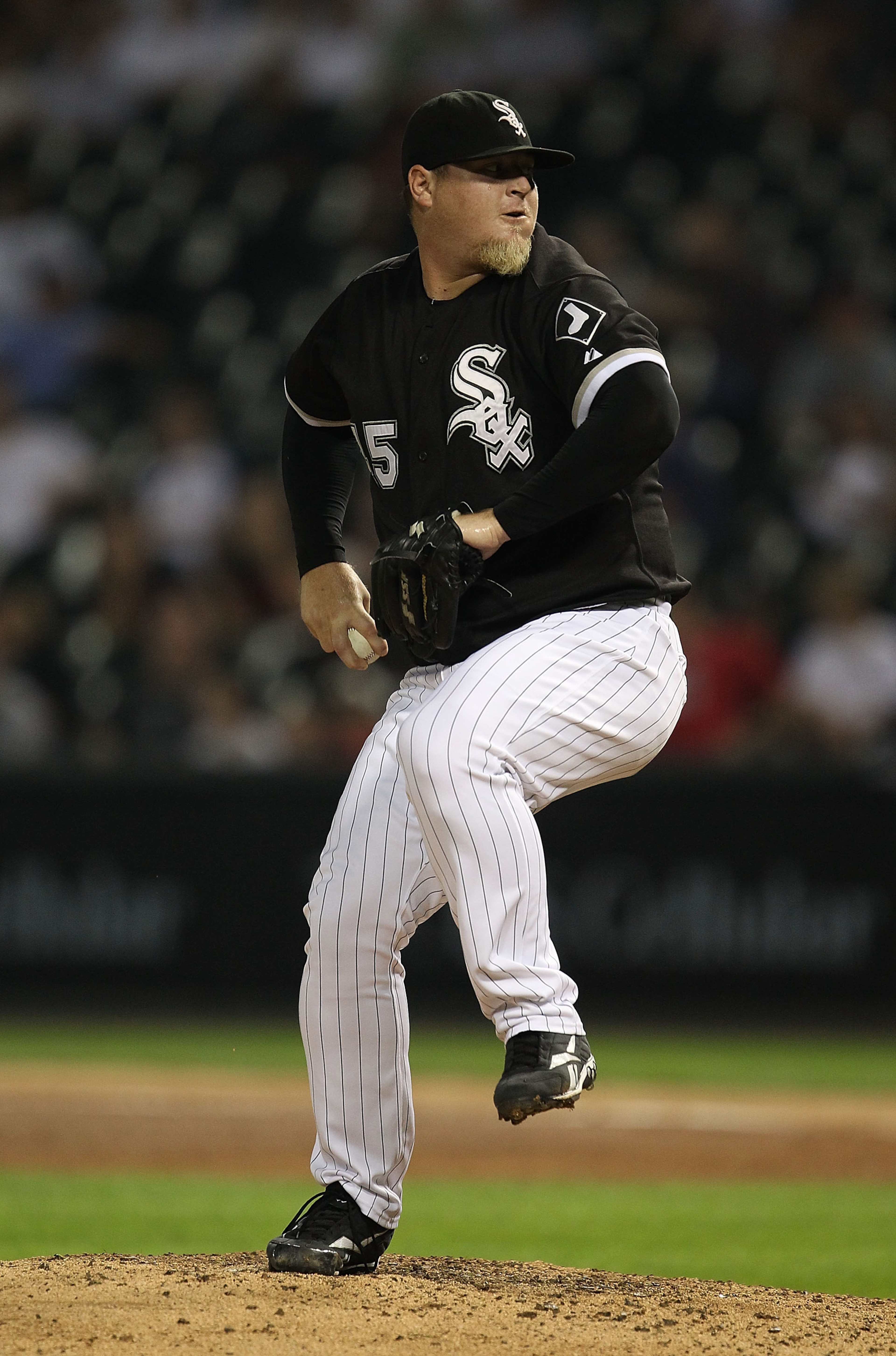 CHICAGO - AUGUST 10: Bobby Jenks #45 of the Chicago White Sox pitches against the Minnesota Twins at U.S. Cellular Field on August 10, 2010 in Chicago, Illinois. The Twins defeated the White Sox 12-6. (Photo by Jonathan Daniel/Getty Images)