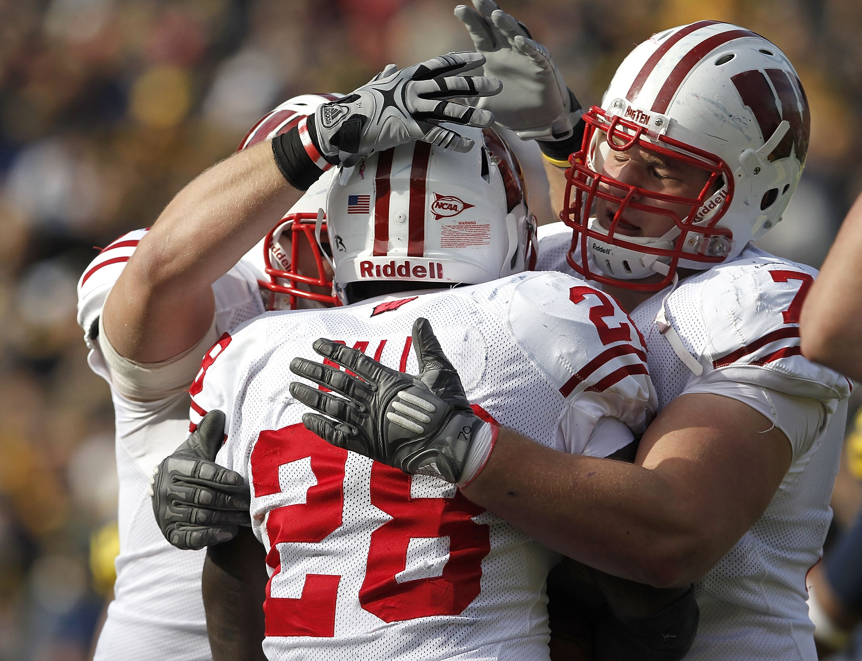 ANN ARBOR, MI - NOVEMBER 20:  Montee Ball #28 of the Wisconsin Badgers celebrates a second quarter touchdown with teammate Kevin Zeitler #70 while playing the Michigan Wolverines at Michigan Stadium on November 20, 2010 in Ann Arbor, Michigan.  (Photo by