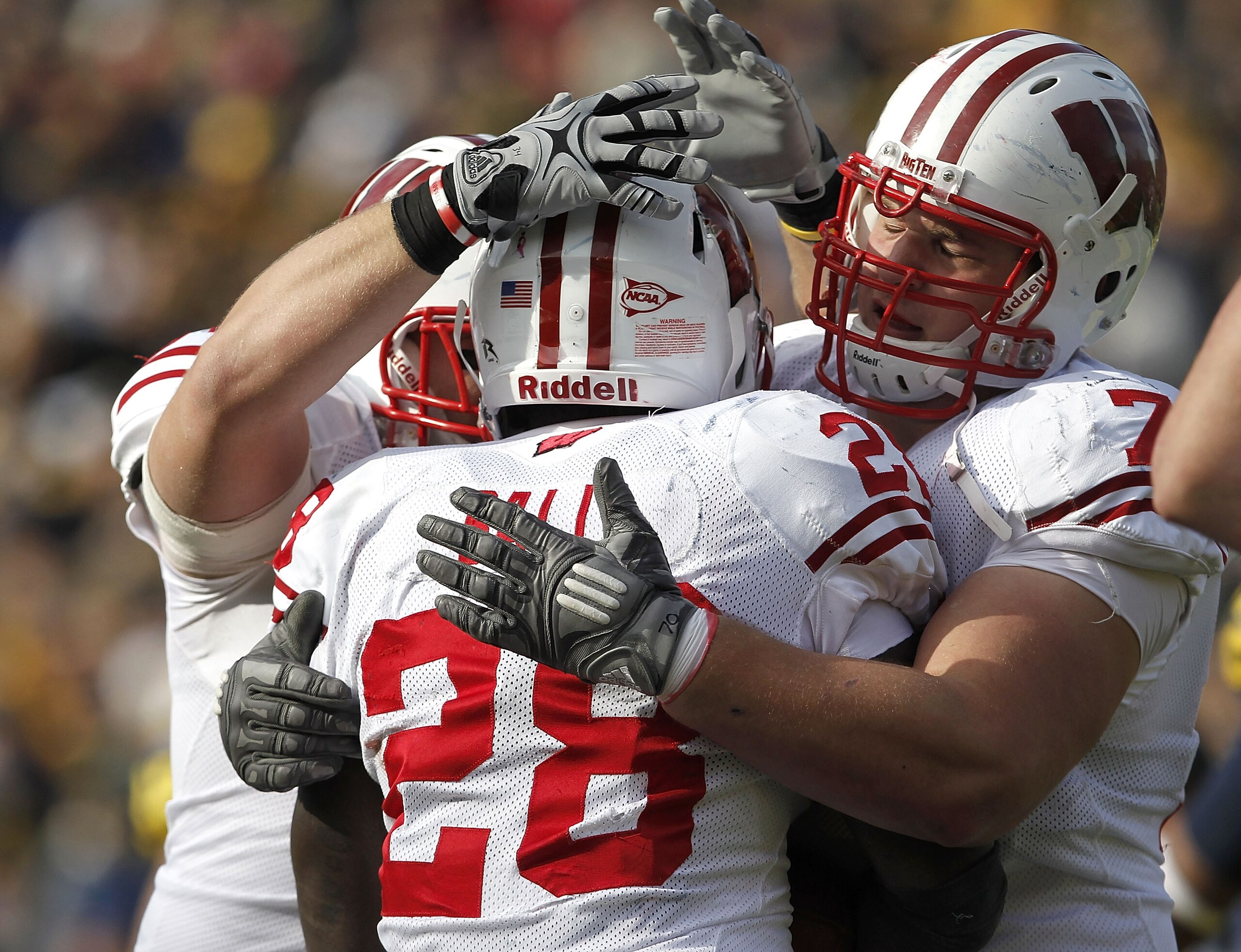 ANN ARBOR, MI - NOVEMBER 20:  Montee Ball #28 of the Wisconsin Badgers celebrates a second quarter touchdown with teammate Kevin Zeitler #70 while playing the Michigan Wolverines at Michigan Stadium on November 20, 2010 in Ann Arbor, Michigan.  (Photo by