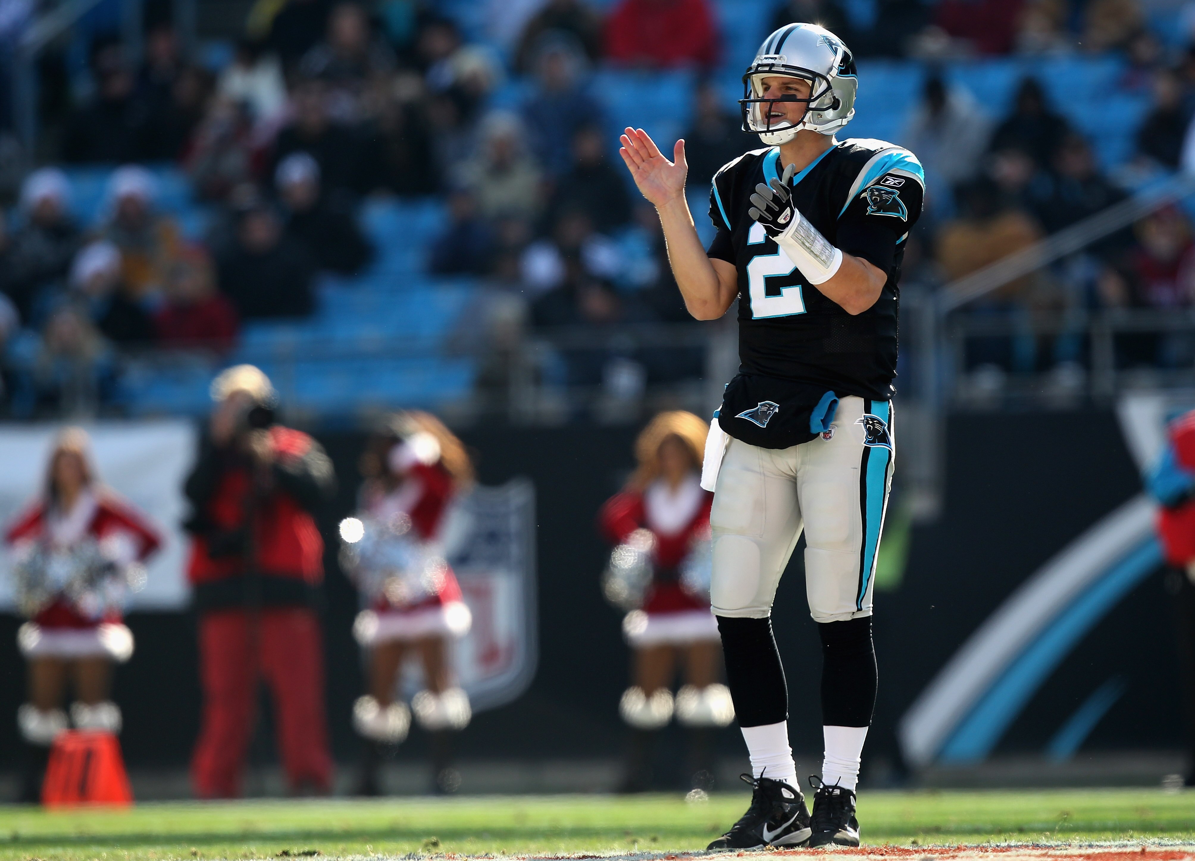 CHARLOTTE, NC - DECEMBER 19:  Jimmy Clausen #2 of the Carolina Panthers cheers on his team during their game against the Arizona Cardinals at Bank of America Stadium on December 19, 2010 in Charlotte, North Carolina.  (Photo by Streeter Lecka/Getty Images