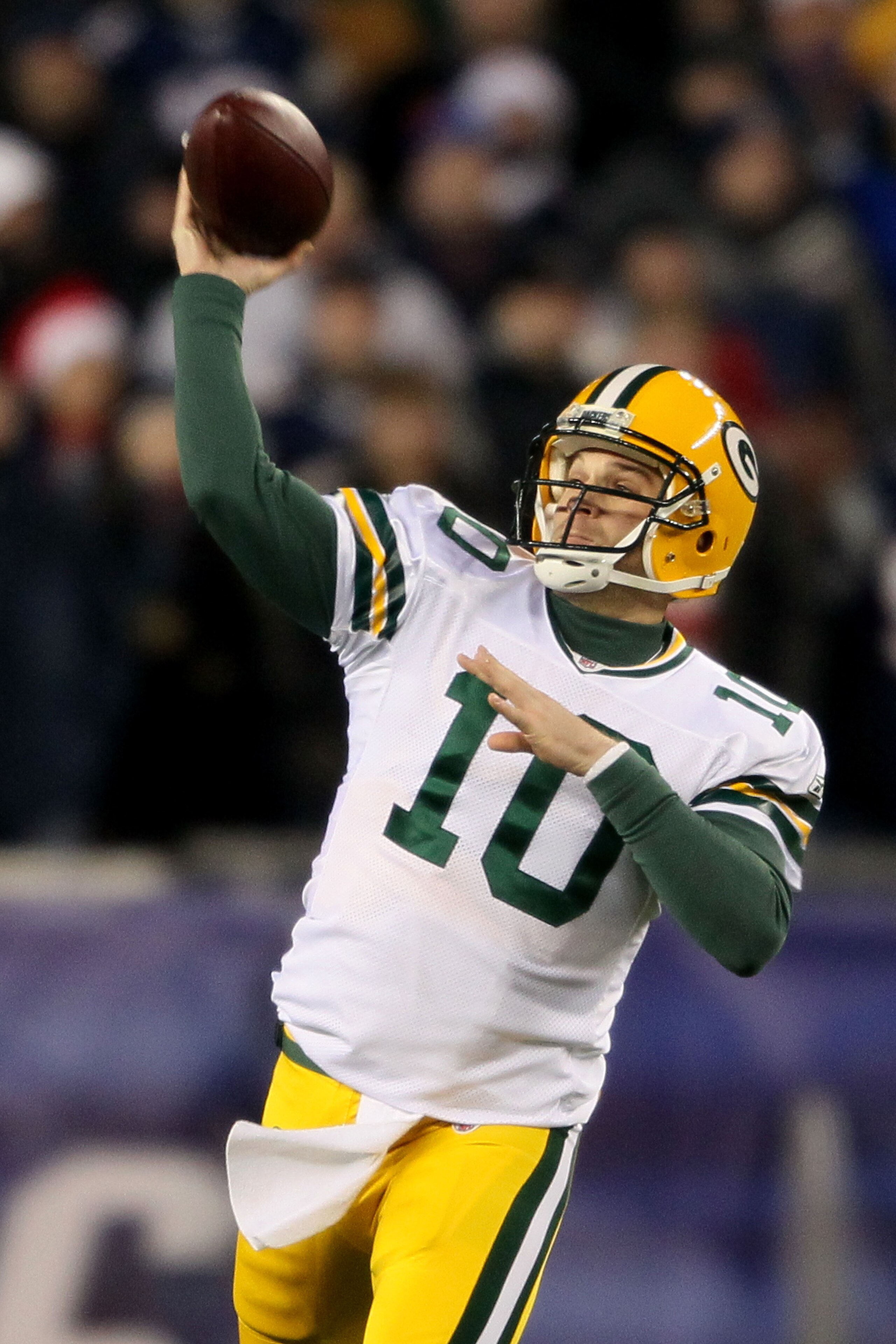 FOXBORO, MA - DECEMBER 19:  Quarterback Matt Flynn #10 of the Green Bay Packers throws a pass to wide receiver James Jones #89 (not pictured) who ran 66 yards to score a touchdown in the second quarter against the New England Patriots at Gillette Stadium