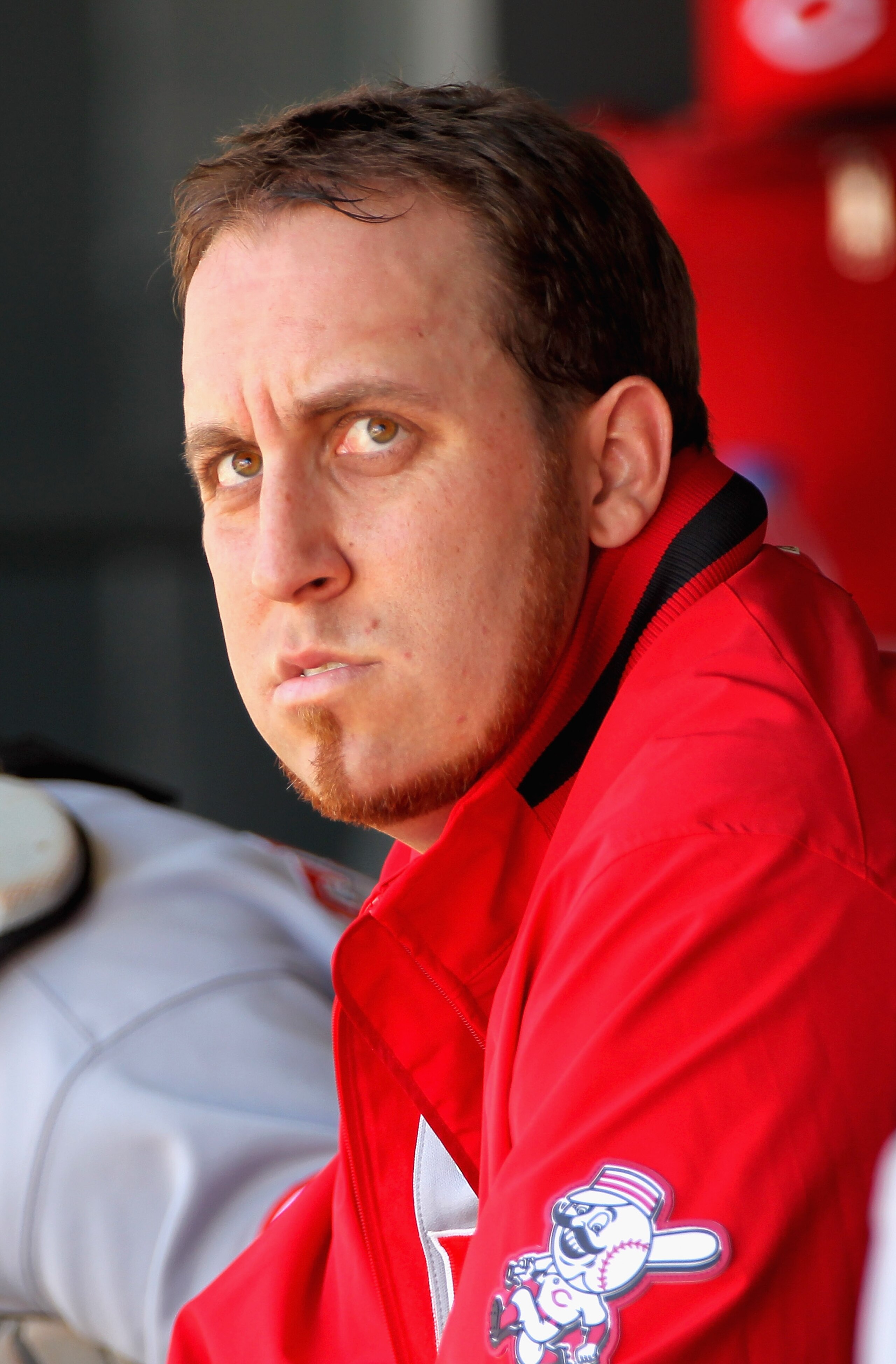 DENVER - SEPTEMBER 06:  Starting pitcher Aaron Harang #39 of the Cincinnati Reds looks on from the dugout bench as he faces the Colorado Rockies at Coors Field on September 6, 2010 in Denver, Colorado.  (Photo by Doug Pensinger/Getty Images)