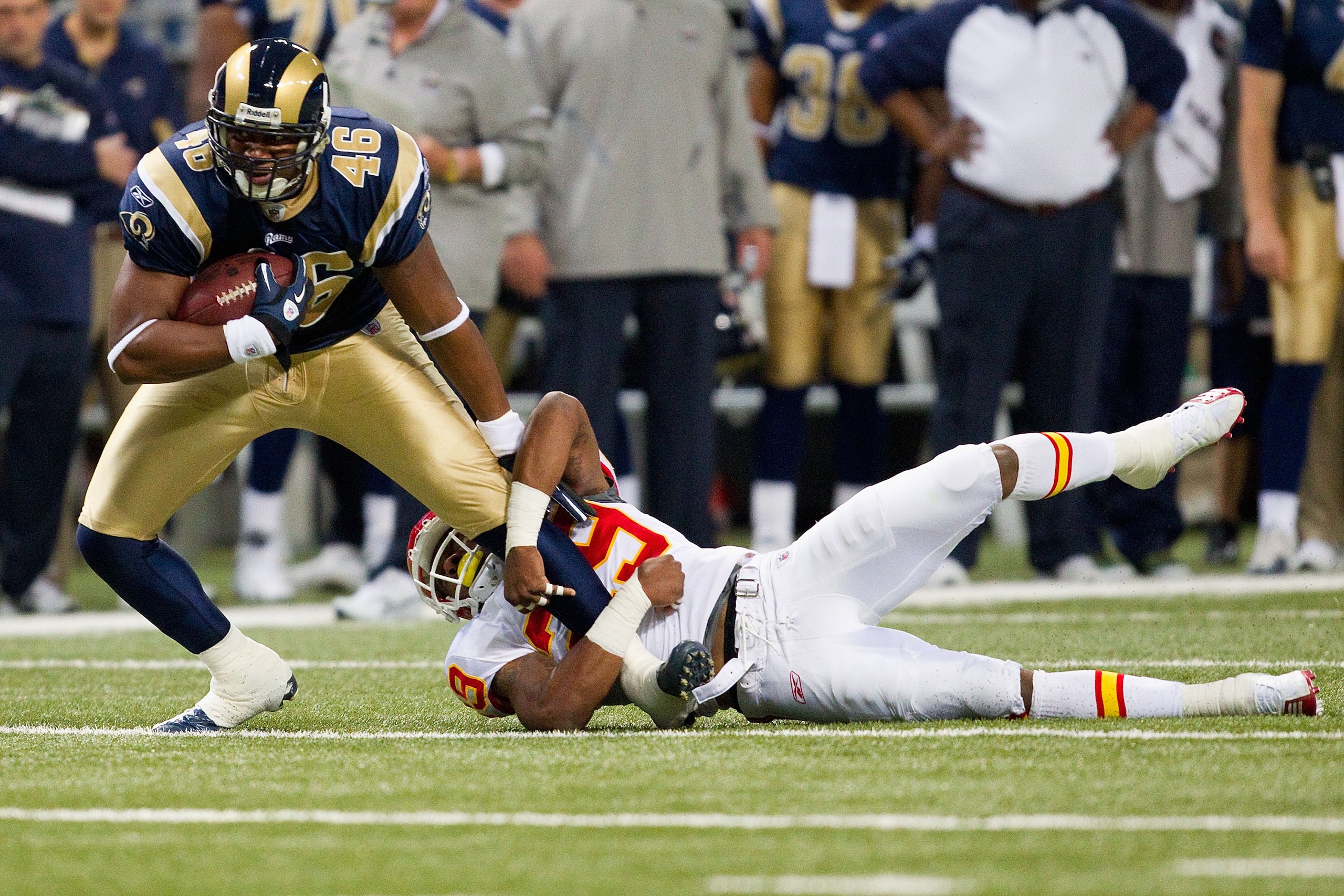ST. LOUIS, MO - DECEMBER 19: Eric Berry #29 of the Kansas City Chiefs tackles Daniel Fells #46 of the St. Louis Rams at the Edward Jones Dome on December 19, 2010 in St. Louis, Missouri.  The Chiefs beat the Rams 27-13.  (Photo by Dilip Vishwanat/Getty Im
