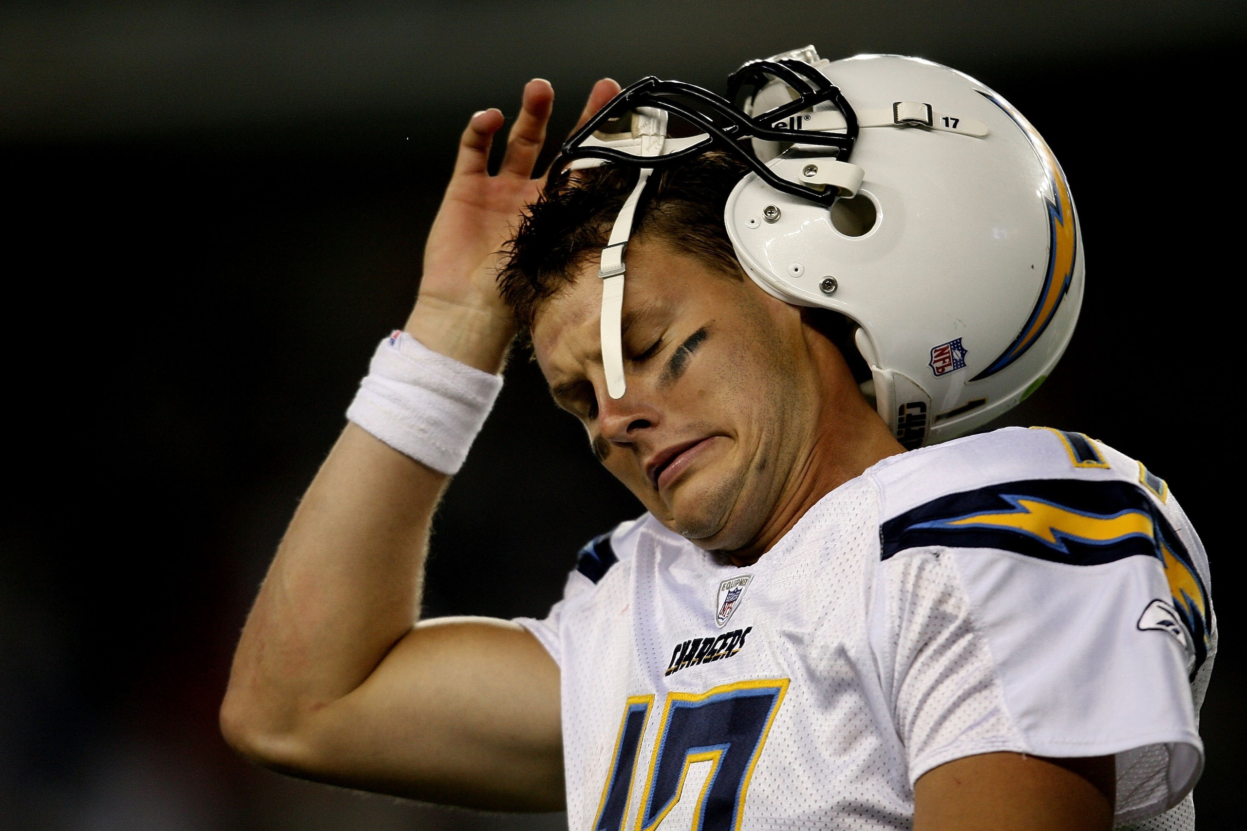 FOXBORO, MA - SEPTEMBER 16:  Quarterback Philip Rivers #17 of the San Diego Chargers takes off his helmet as they lose to the New England Patriots at Gillette Stadium September 16, 2007 in Foxboro, Massachusetts.  (Photo by Nick Laham/Getty Images)