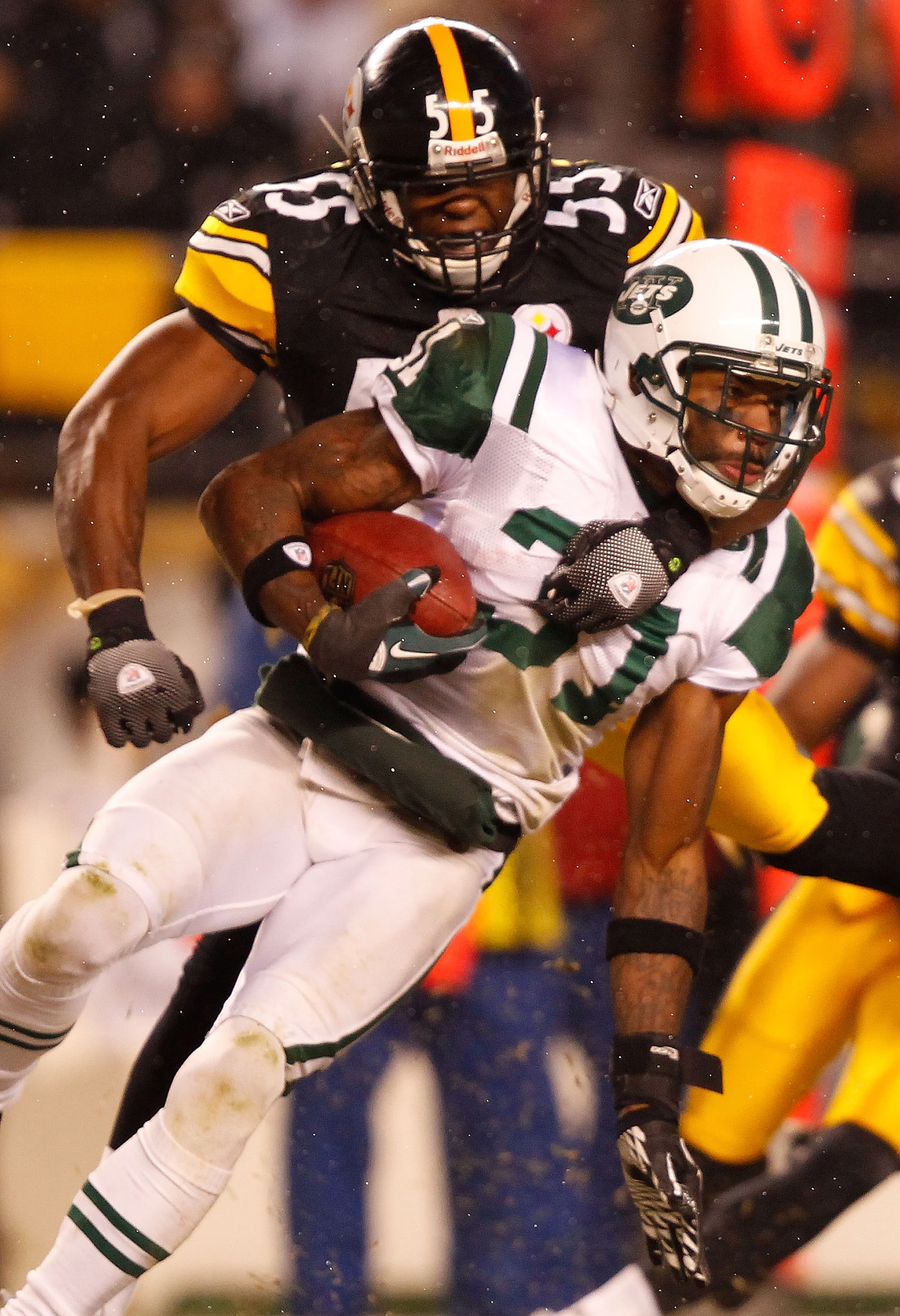 PITTSBURGH - DECEMBER 19:  Antonio Cromartie #31 of the New York Jets is tackled by Stevenson Sylvester #55 of the Pittsburgh Steelers during the game on December 19, 2010 at Heinz Field in Pittsburgh, Pennsylvania.  (Photo by Jared Wickerham/Getty Images