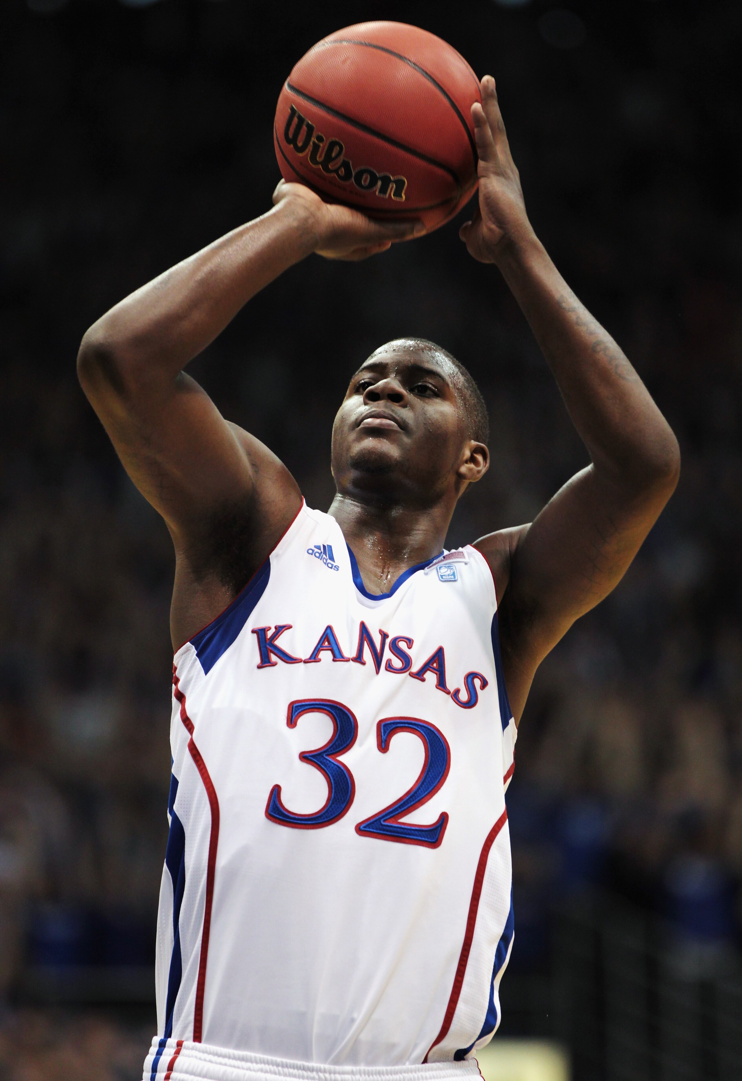 LAWRENCE, KS - DECEMBER 18:  Josh Selby #32 of the Kansas Jayhawks shoots a free throw during the game against the USC Trojans on December 18, 2010 at Allen Fieldhouse in Lawrence, Kansas.  (Photo by Jamie Squire/Getty Images)