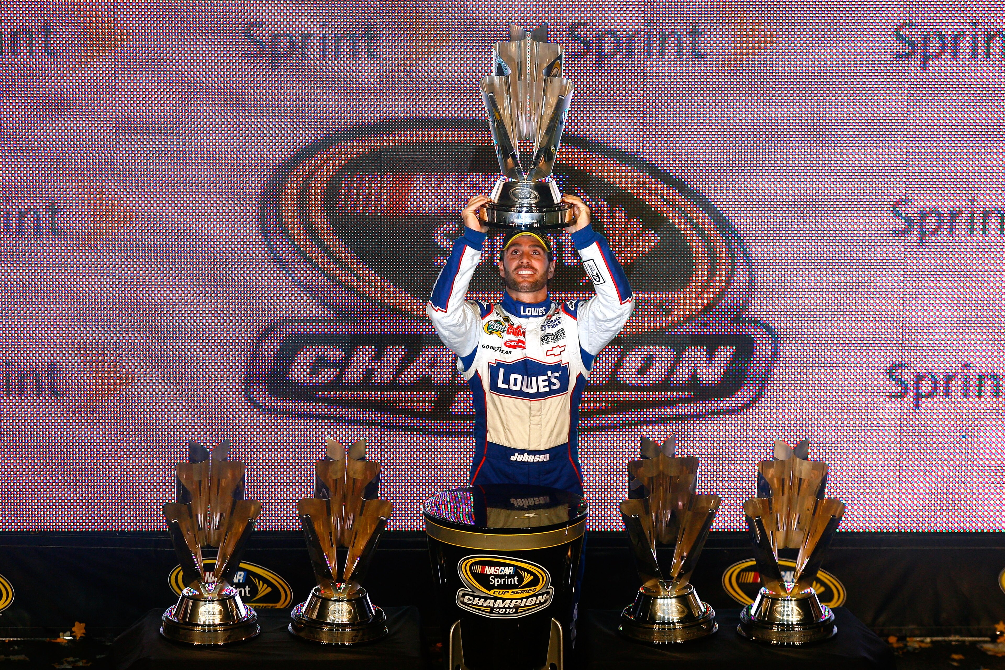 HOMESTEAD, FL - NOVEMBER 21: Jimmie Johnson, driver of the #48 Lowe's Chevrolet, celebrates after finishing in second place in the Ford 400 to clinch his fifth consecutive NASCAR Sprint Cup championship at Homestead-Miami Speedway on November 21, 2010 in HOMESTEAD, FL - NOVEMBER 21: Jimmie Johnson, driver of the #48 Lowe's Chevrolet, celebrates after finishing in second place in the Ford 400 to clinch his fifth consecutive NASCAR Sprint Cup championship at Homestead-Miami Speedway on November 21, 2010 in