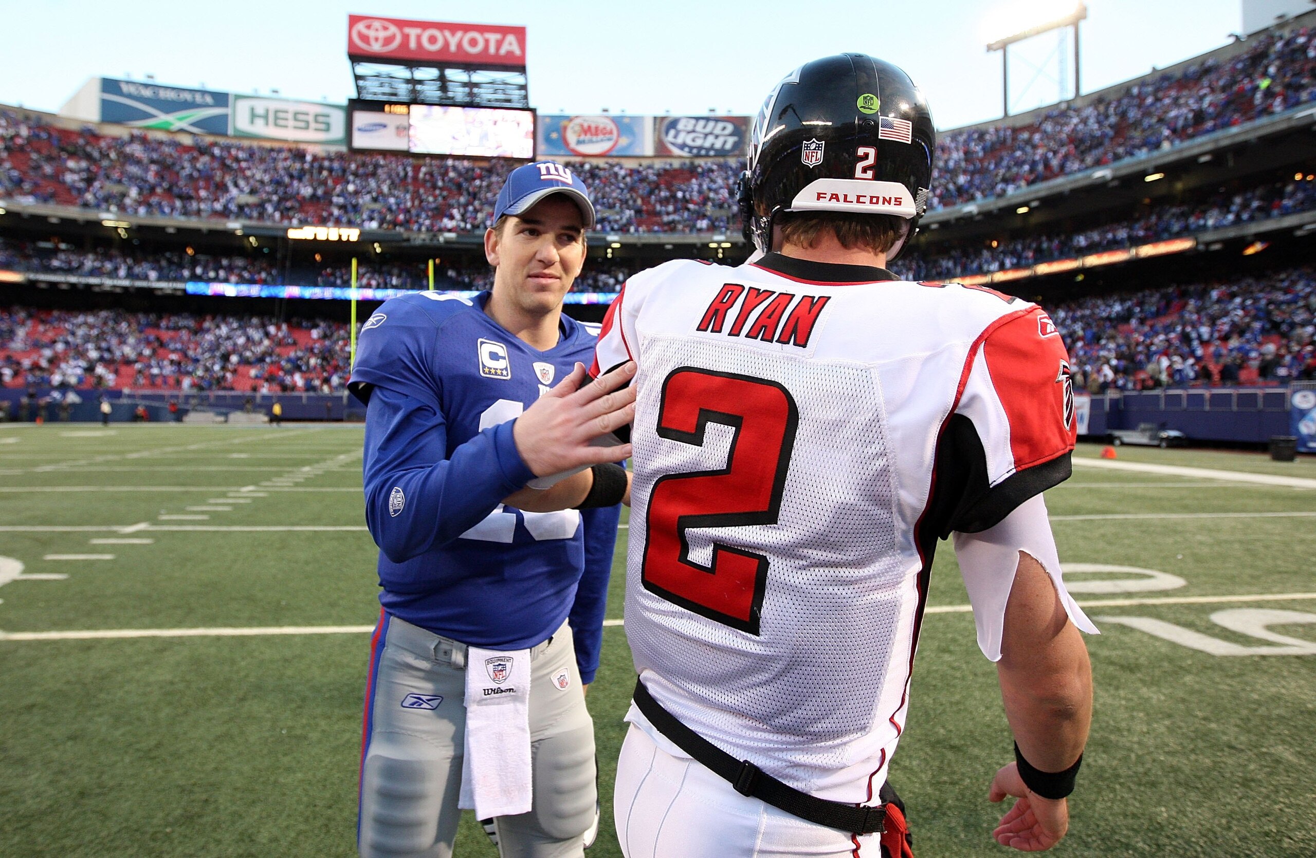 EAST RUTHERFORD, NJ - NOVEMBER 22:  Eli Manning #10 of the New York Giants talks with Matt Ryan #2 of the Atlanta Falcons after their game on November 22, 2009 at Giants Stadium in East Rutherford, New Jersey. The Giants defeated the Falcons 34-31 in over