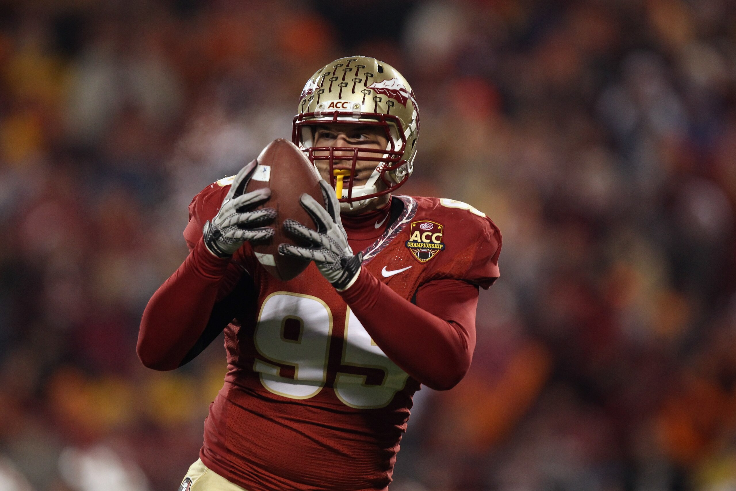 CHARLOTTE, NC - DECEMBER 04:  Bjoern Werner #95 of the Florida State Seminoles against the Virginia Tech Hokies during their game at Bank of America Stadium on December 4, 2010 in Charlotte, North Carolina.  (Photo by Streeter Lecka/Getty Images)