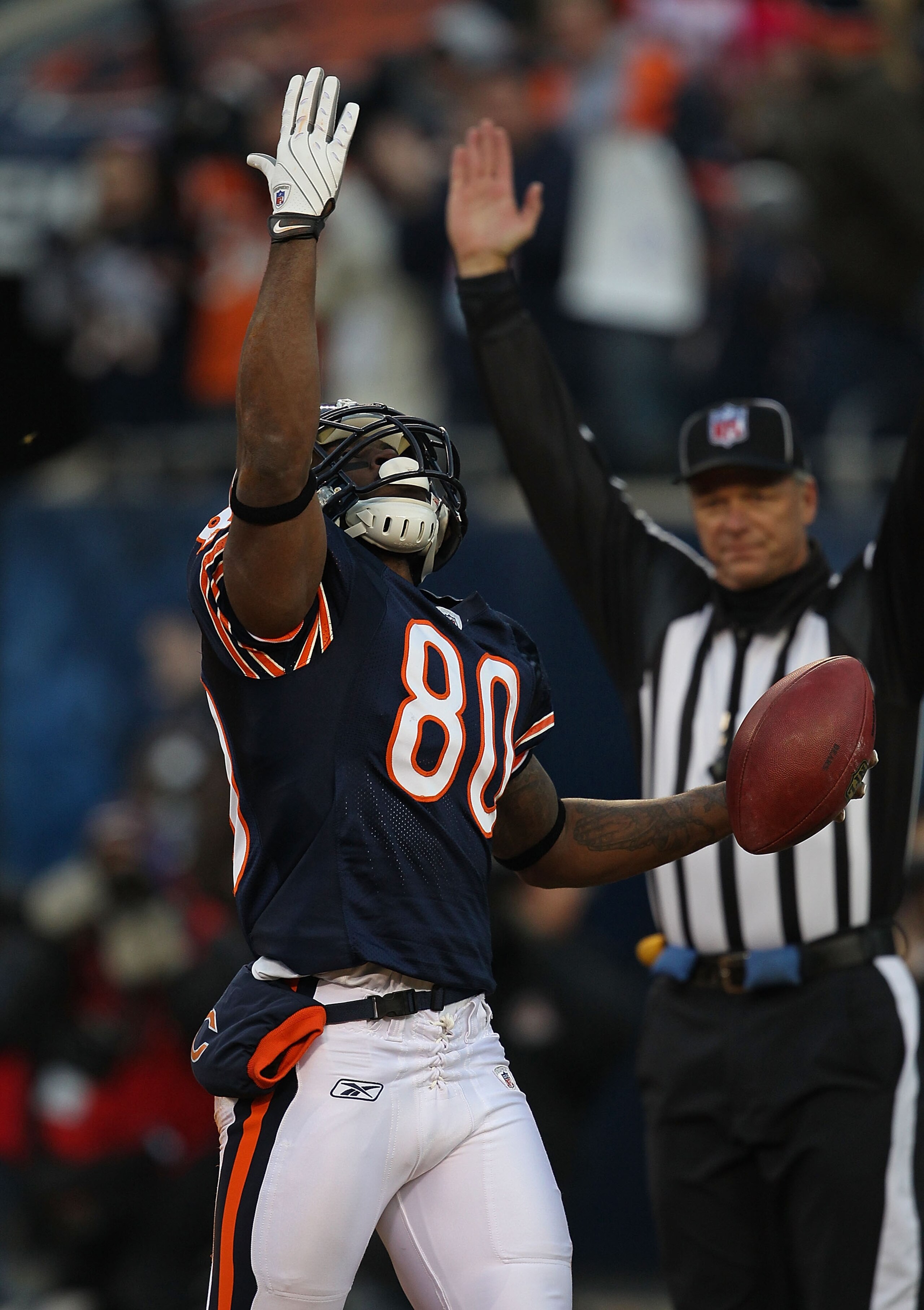 CHICAGO - NOVEMBER 28: Earl Bennett #80 of the Chicago Bears celebrates the first of two 1st half touchdown catches against the Philadelphia Eagles at Soldier Field on November 28, 2010 in Chicago, Illinois. (Photo by Jonathan Daniel/Getty Images)