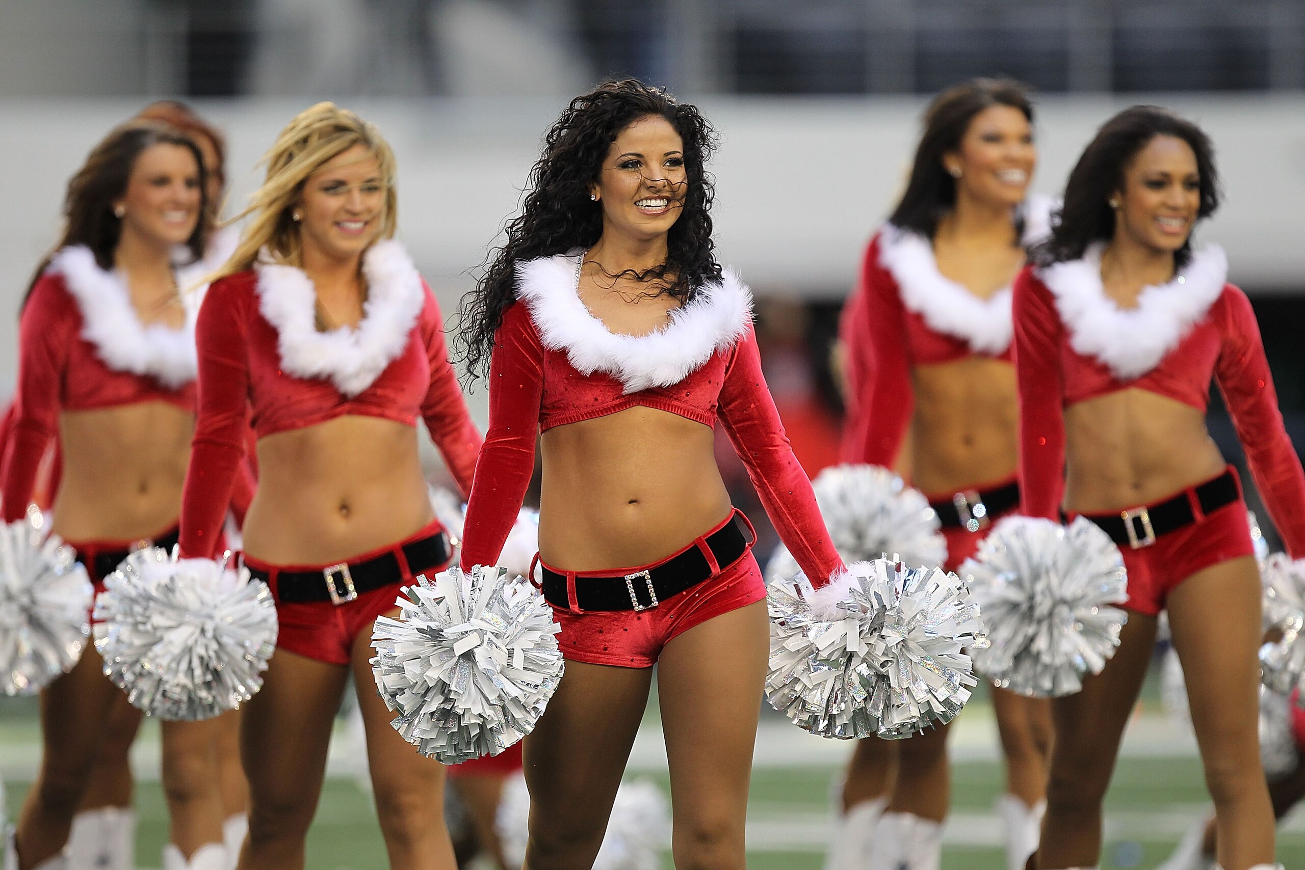 ARLINGTON, TX - DECEMBER 19: The Dallas Cowboys Cheerleaders perform at Cowboys Stadium on December 19, 2010 in Arlington, Texas. (Photo by Ronald Martinez/Getty Images) ARLINGTON, TX - DECEMBER 19: The Dallas Cowboys Cheerleaders perform at Cowboys Stadium on December 19, 2010 in Arlington, Texas. (Photo by Ronald Martinez/Getty Images)