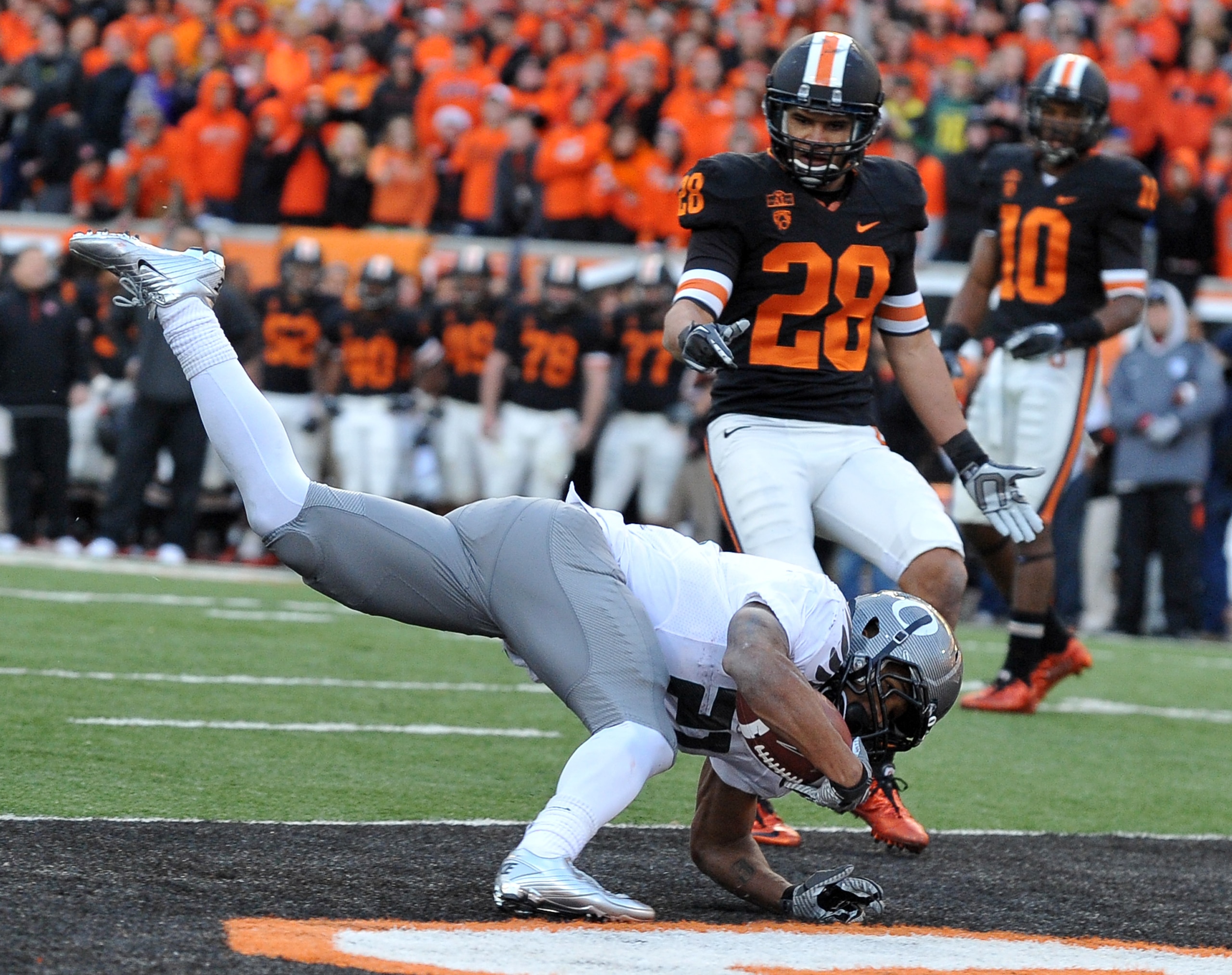 CORVALLIS, OR - DECEMBER 4: LaMichael James #21 of the Oregon Ducks flies into the end zone for a touchdown in the fourth quarter of the game at Reser Stadium on December 4, 2010 in Corvallis, Oregon. The Ducks beat the Beavers 37-20 to likely go on the B