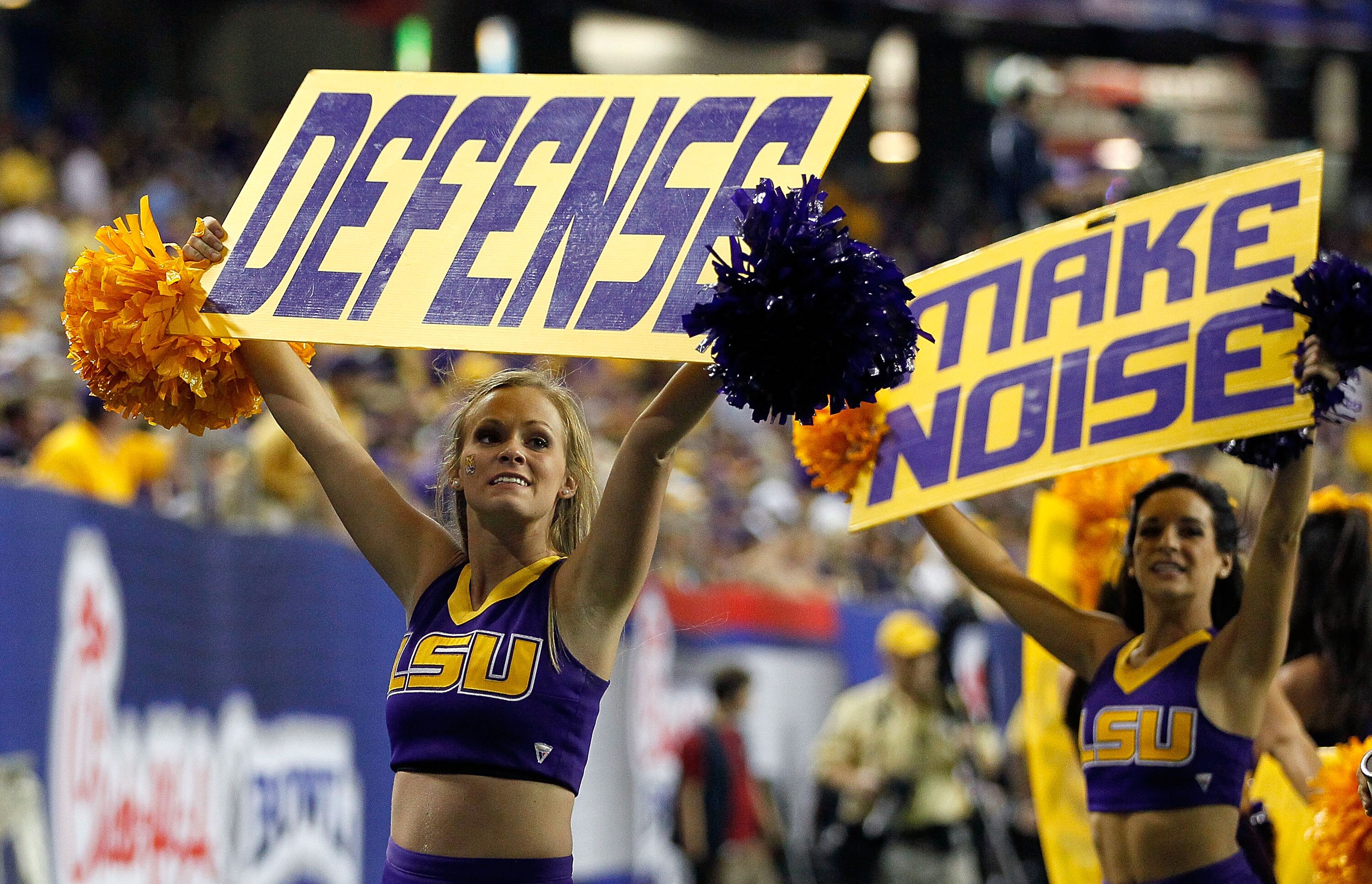 ATLANTA - SEPTEMBER 04:  The LSU Tigers cheerleaders cheer for their defense in the final minutes of their 30-24 win over the North Carolina Tar Heels during the Chick-fil-A Kickoff Game at Georgia Dome on September 4, 2010 in Atlanta, Georgia.  (Photo by