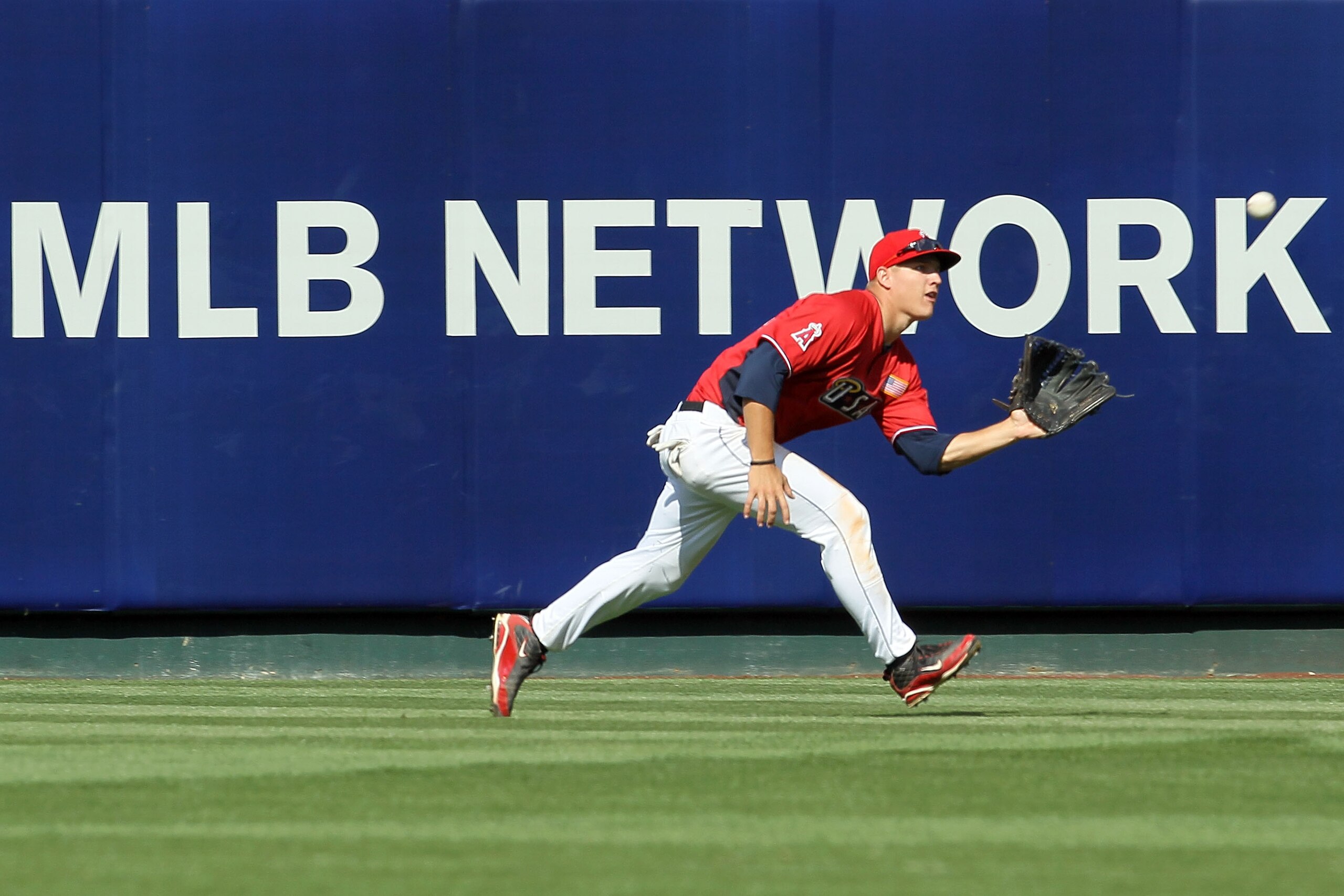 ANAHEIM, CA - JULY 11:  U.S. Futures All-Star Brett Jackson #13 of the Chicago Cubs makes the catch on a fly ball during the 2010 XM All-Star Futures Game at Angel Stadium of Anaheim on July 11, 2010 in Anaheim, California.  (Photo by Stephen Dunn/Getty I