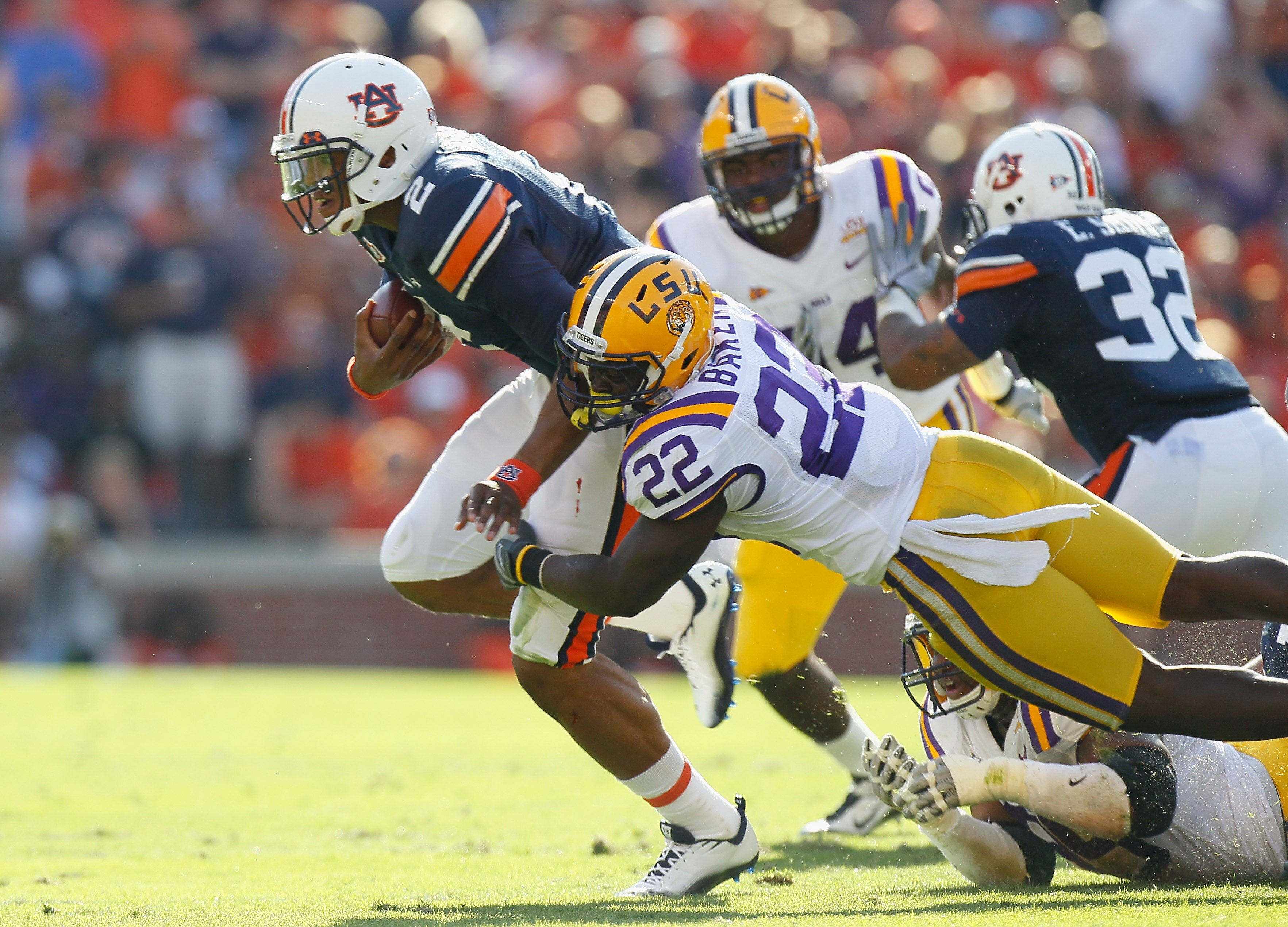AUBURN, AL - OCTOBER 23:  Quarterback Cameron Newton #2 of the Auburn Tigers against Ryan Baker #22 of the LSU Tigers at Jordan-Hare Stadium on October 23, 2010 in Auburn, Alabama.  (Photo by Kevin C. Cox/Getty Images)