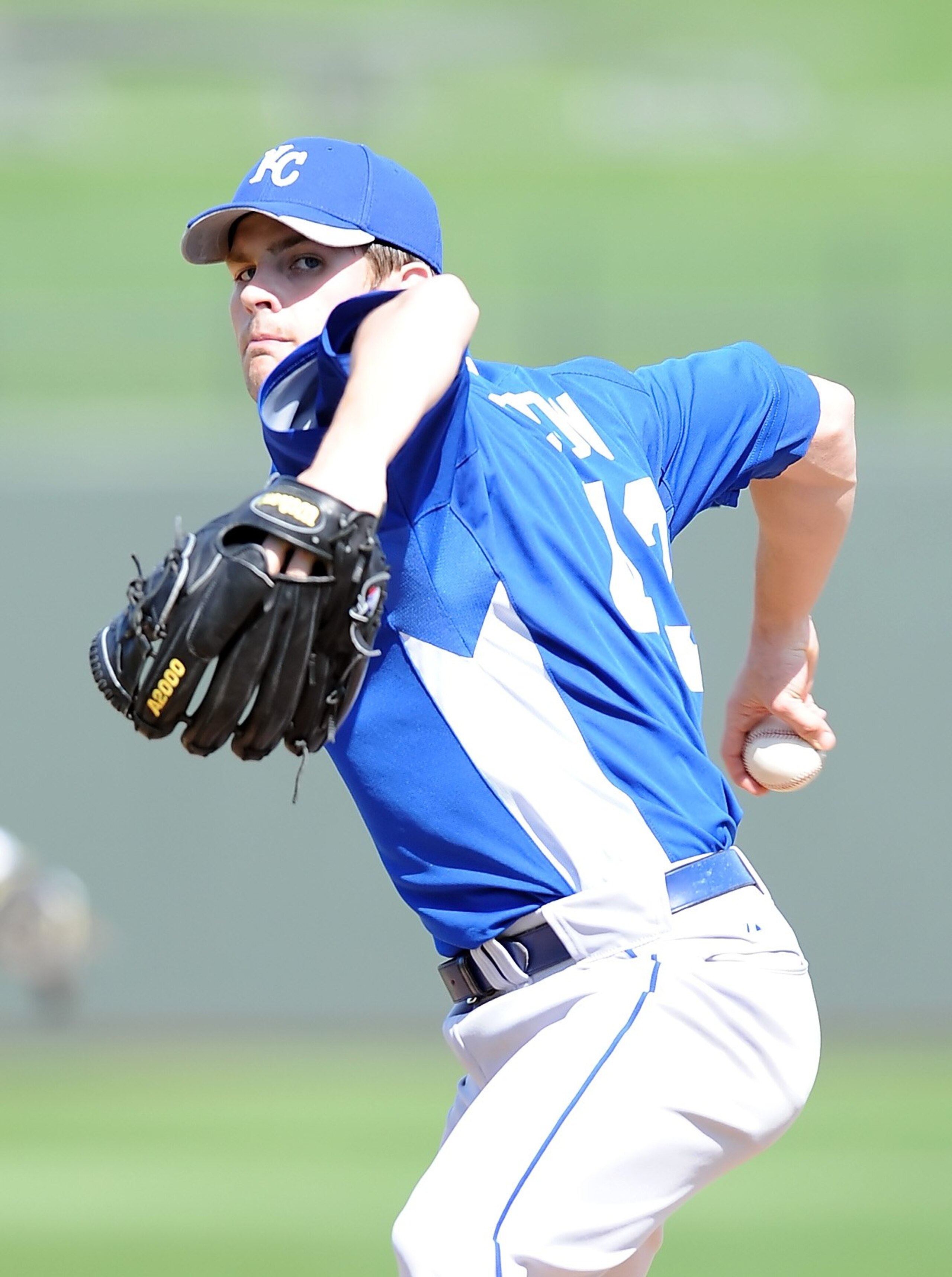 SURPRISE, AZ - MARCH 06:  Aaron Crow #43 of the Kansas City Royals pitches during a Spring Training game against the Texas Rangers on March 6, 2010 in Surprise, Arizona.  (Photo by Lisa Blumenfeld/Getty Images)