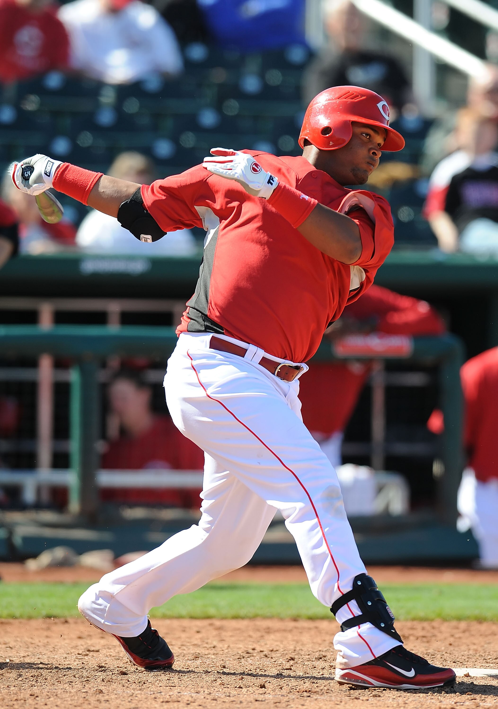 GOODYEAR, AZ - MARCH 11:  Juan Francisco #64 of the Cincinnati Reds at bat during a Spring Training game against the Milwaukee Brewers on March 11, 2010 at Goodyear Ballpark in Goodyear, Arizona.  (Photo by Lisa Blumenfeld/Getty Images)