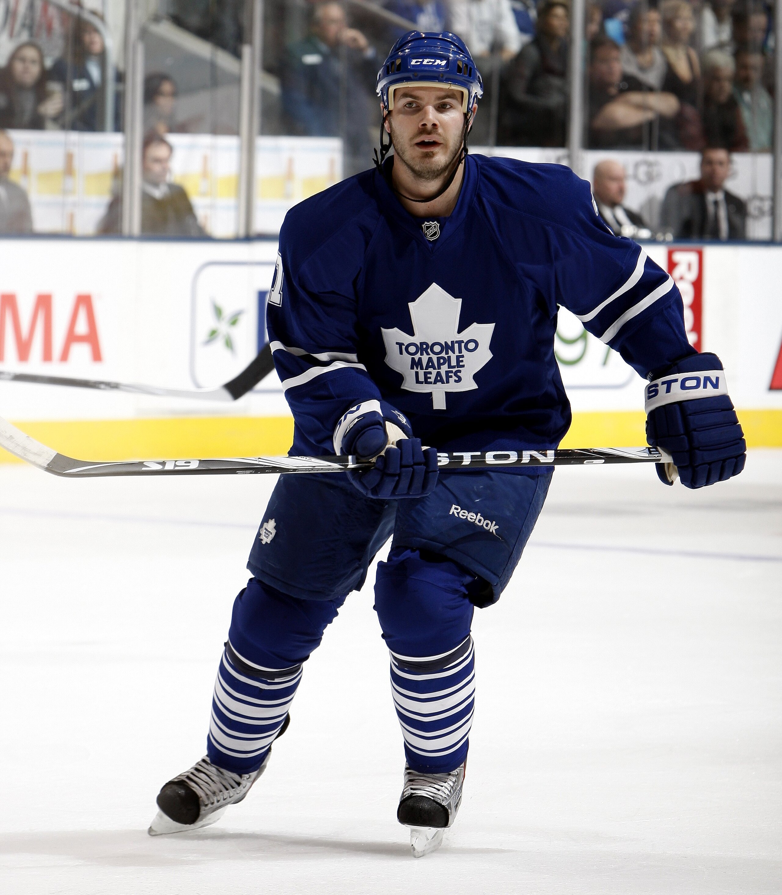 TORONTO - JANUARY 30: Ian White #7 of the Toronto Maple Leafs skates up the ice during game action against the Vancouver Canucks January 30, 2010 at the Air Canada Centre in Toronto, Ontario, Canada. (Photo by Abelimages / Getty Images)