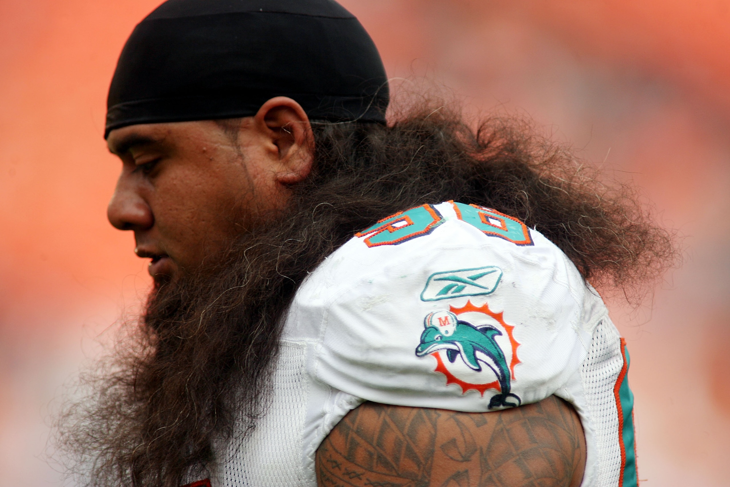 MIAMI - DECEMBER 19: Defensive tackle Paul Soliai #96 of the Miami Dolphins walks off the field against the Buffalo Bills at Sun Life Stadium on December 19, 2010 in Miami, Florida. The Bills defeated the Dolphins 17-14. (Photo by Marc Serota/Getty Imag MIAMI - DECEMBER 19: Defensive tackle Paul Soliai #96 of the Miami Dolphins walks off the field against the Buffalo Bills at Sun Life Stadium on December 19, 2010 in Miami, Florida. The Bills defeated the Dolphins 17-14. (Photo by Marc Serota/Getty Imag