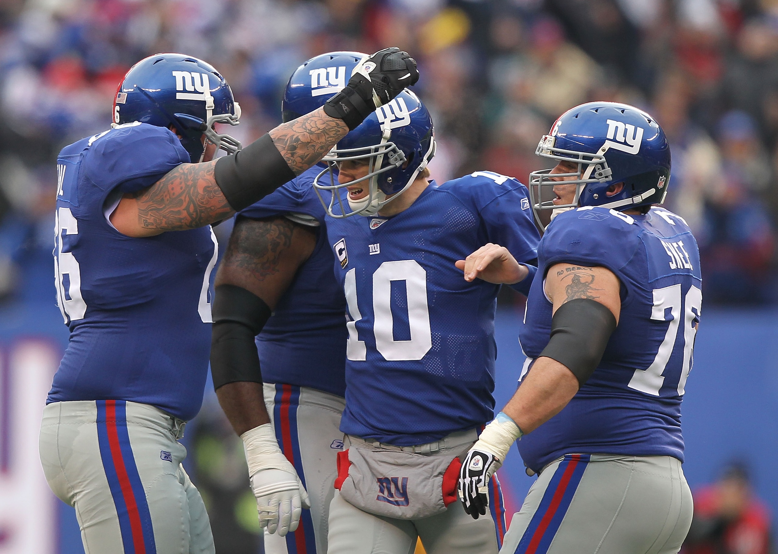 EAST RUTHERFORD, NJ - DECEMBER 19: Eli Manning #10 of the New York Giants celebrates a touchdown by Mario Manningham against the Philadelphia Eagles during their game on December 19, 2010 at The New Meadowlands Stadium in East Rutherford, New Jersey. (P EAST RUTHERFORD, NJ - DECEMBER 19: Eli Manning #10 of the New York Giants celebrates a touchdown by Mario Manningham against the Philadelphia Eagles during their game on December 19, 2010 at The New Meadowlands Stadium in East Rutherford, New Jersey. (P