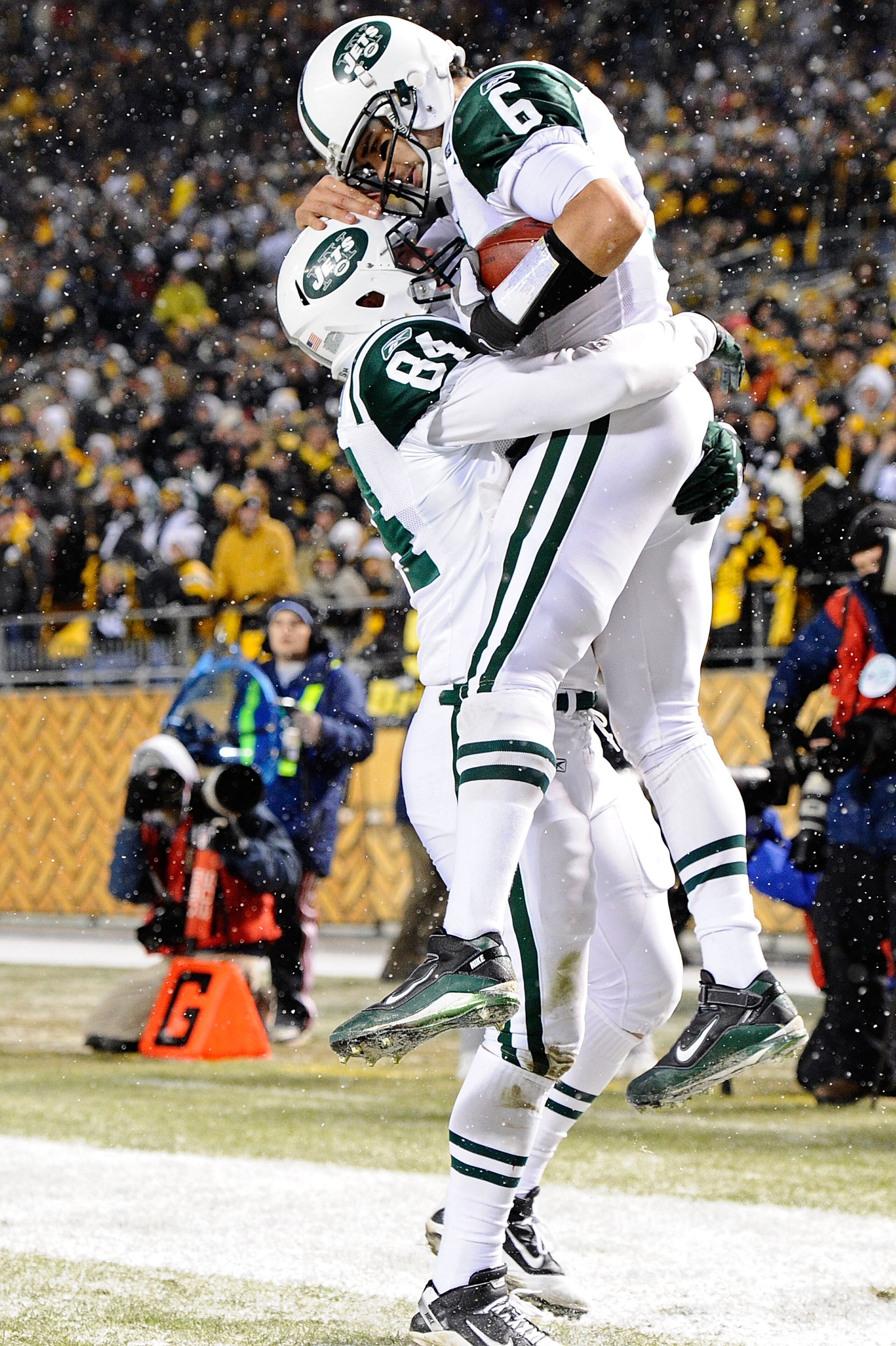 PITTSBURGH, PA - DECEMBER 19: Mark Sanchez #6 and Ben Hartsock #84 of the New York Jets celebrate after Sanchez ran for a touchdown during their game against Pittsburgh Steelers at Heinz Field on December 19, 2010 in Pittsburgh, Pennsylvania. (Photo by PITTSBURGH, PA - DECEMBER 19: Mark Sanchez #6 and Ben Hartsock #84 of the New York Jets celebrate after Sanchez ran for a touchdown during their game against Pittsburgh Steelers at Heinz Field on December 19, 2010 in Pittsburgh, Pennsylvania. (Photo by