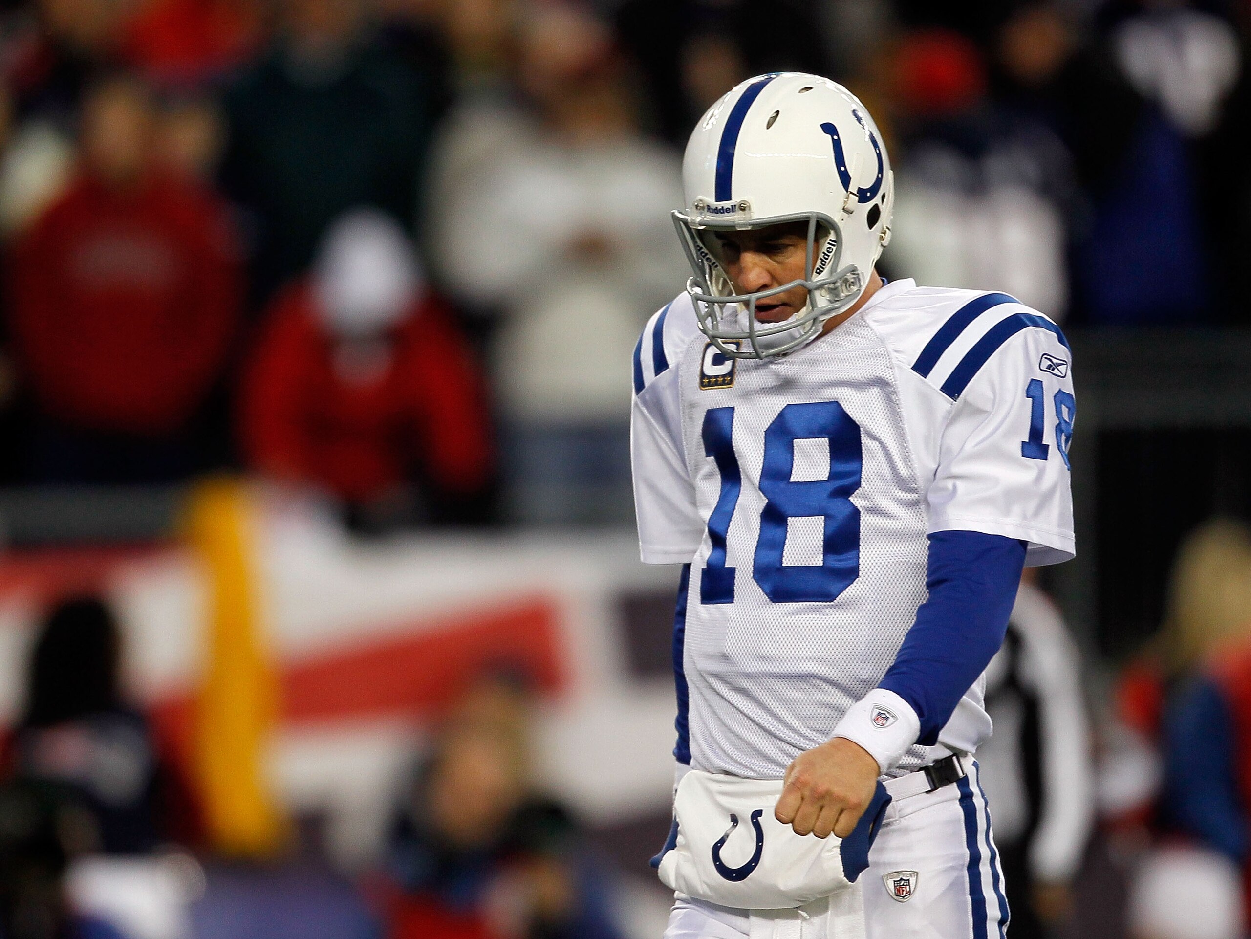 FOXBORO, MA - NOVEMBER 21: Peyton Manning #18 of the Indianapolis Colts walks to the huddle against the New England Patriots at Gillette Stadium on November 21, 2010 in Foxboro, Massachusetts. (Photo by Jim Rogash/Getty Images) FOXBORO, MA - NOVEMBER 21: Peyton Manning #18 of the Indianapolis Colts walks to the huddle against the New England Patriots at Gillette Stadium on November 21, 2010 in Foxboro, Massachusetts. (Photo by Jim Rogash/Getty Images)