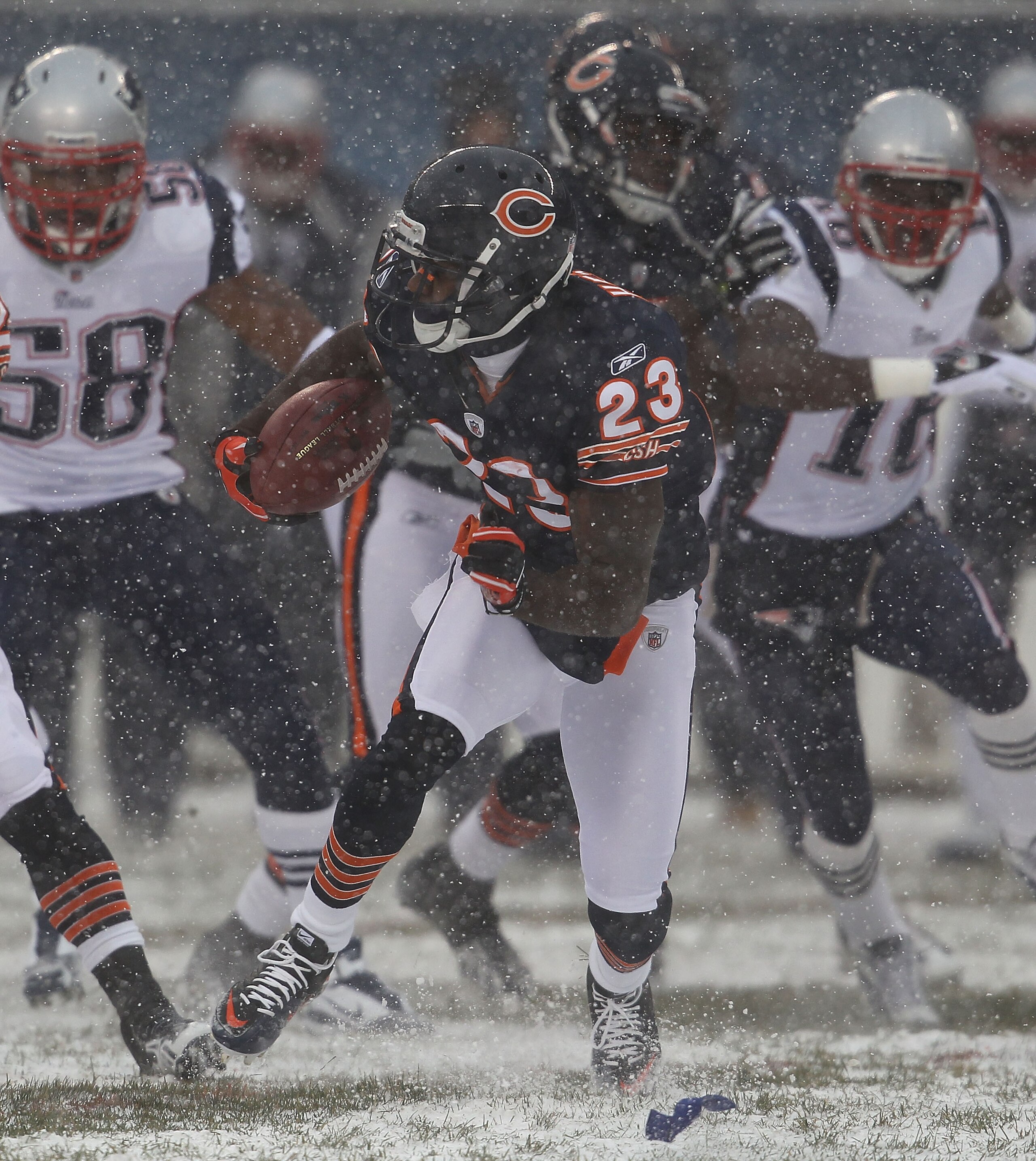 CHICAGO, IL - DECEMBER 12: Devin Hester #23 of the Chicago Bears runs after fielding a punt against the New England Patriots at Soldier Field on December 12, 2010 in Chicago, Illinois. The Patriots defeated the Bears 36-7. (Photo by Jonathan Daniel/Getty CHICAGO, IL - DECEMBER 12: Devin Hester #23 of the Chicago Bears runs after fielding a punt against the New England Patriots at Soldier Field on December 12, 2010 in Chicago, Illinois. The Patriots defeated the Bears 36-7. (Photo by Jonathan Daniel/Getty