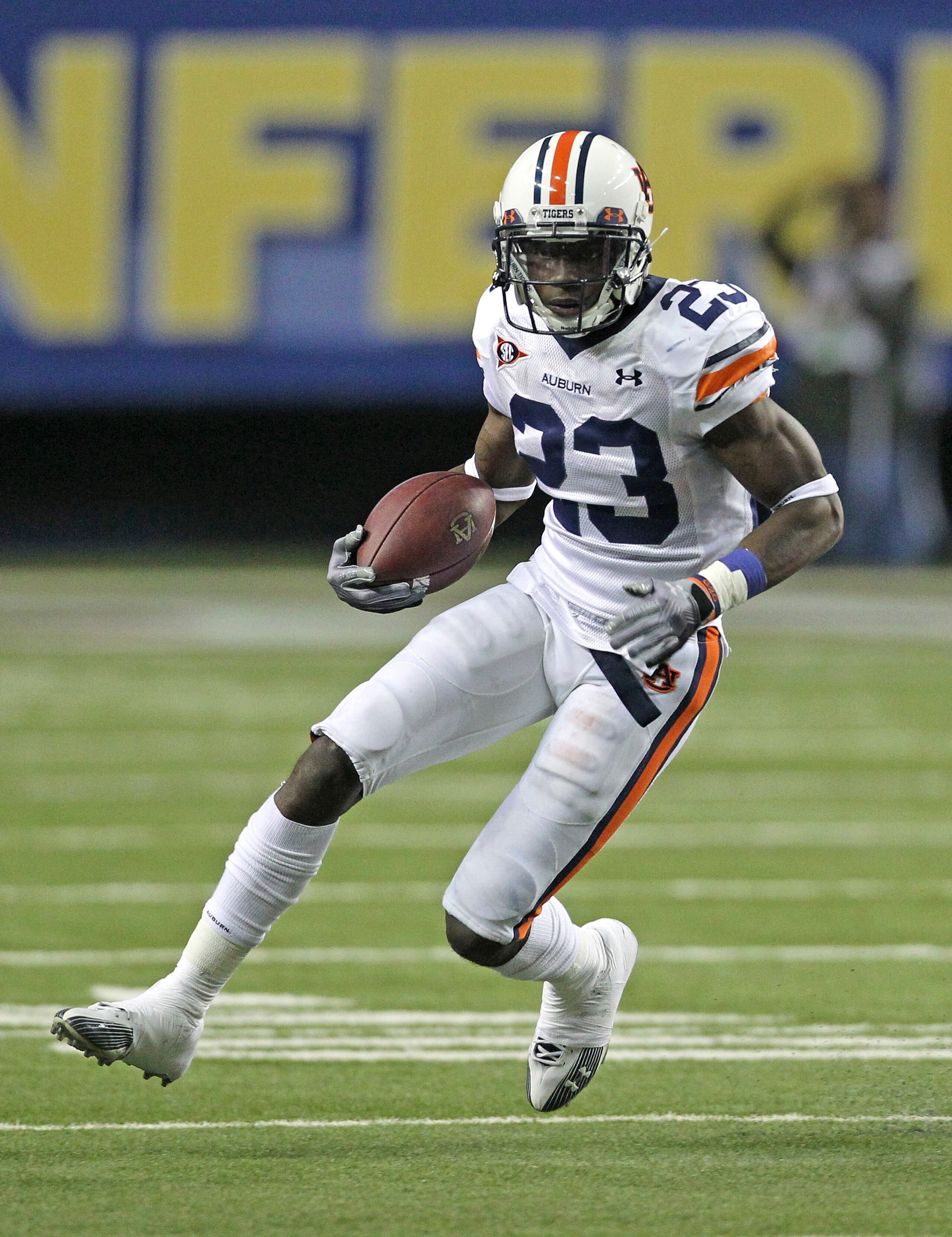 ATLANTA - DECEMBER 4: Running back Onterio McCalebb #23 of the Auburn Tigers runs with the ball during the 2010 SEC Championship against the South Carolina Gamecocks at Georgia Dome on December 4, 2010 in Atlanta, Georgia. The Tigers beat the Gamecocks ATLANTA - DECEMBER 4: Running back Onterio McCalebb #23 of the Auburn Tigers runs with the ball during the 2010 SEC Championship against the South Carolina Gamecocks at Georgia Dome on December 4, 2010 in Atlanta, Georgia. The Tigers beat the Gamecocks
