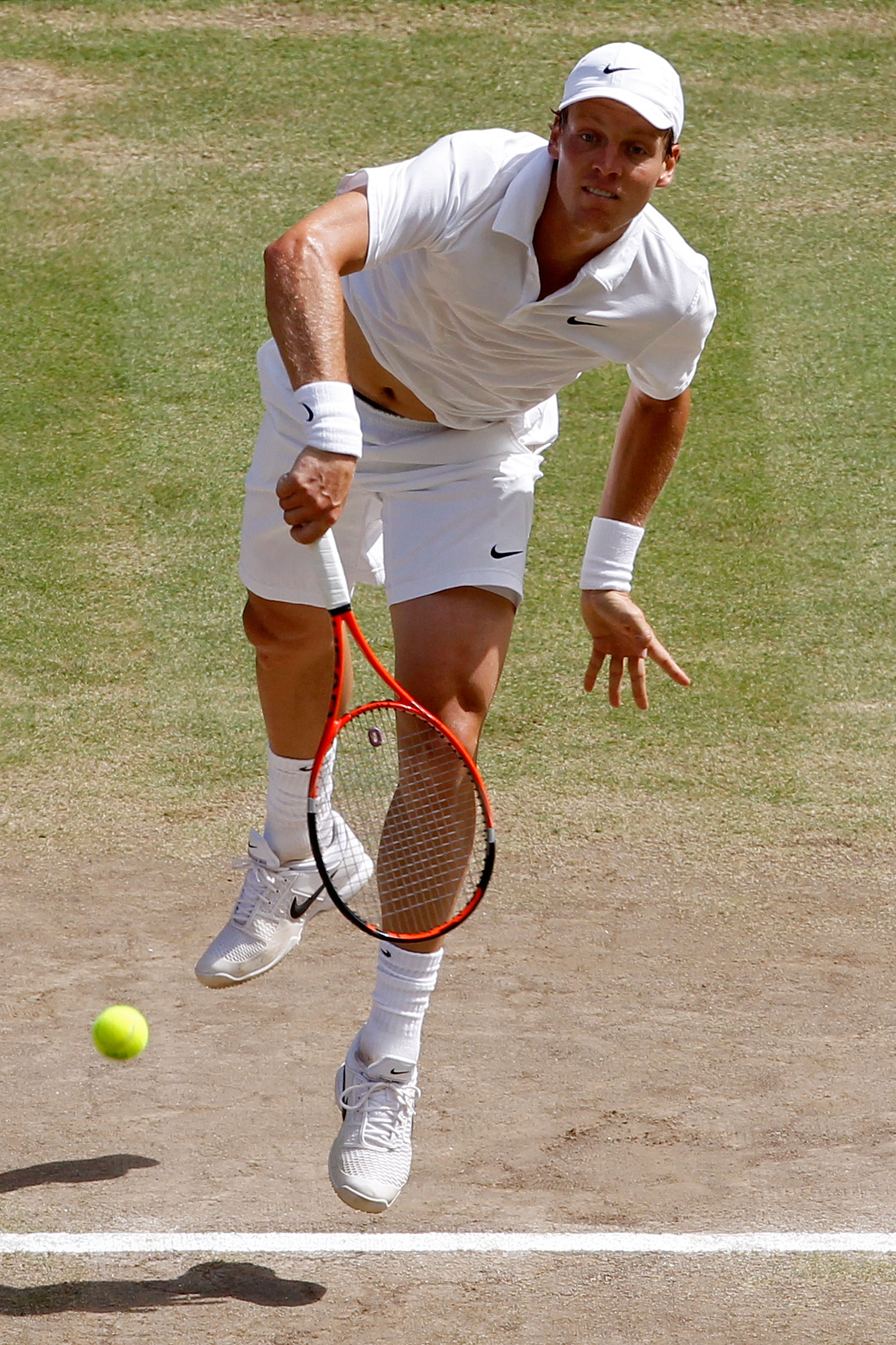 LONDON, ENGLAND - JULY 04:  Tomas Berdych of Czech Republic serves during the Men's Singles Final match against Rafael Nadal of Spain on Day Thirteen of the Wimbledon Lawn Tennis Championships at the All England Lawn Tennis and Croquet Club on July 4, 201