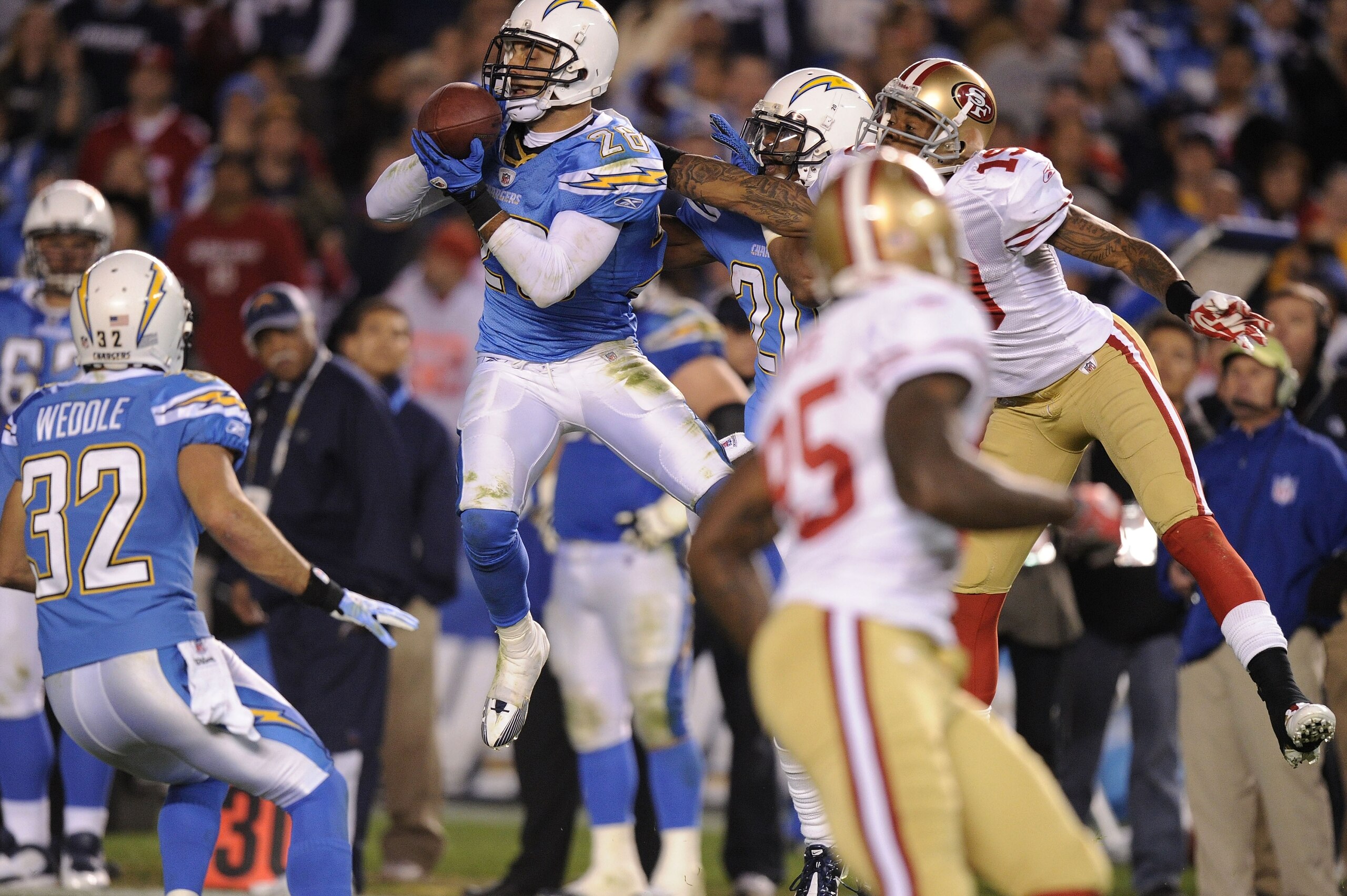 SAN DIEGO, CA - DECEMBER 16:  Safety Steve Gregory #28 of the San Diego Chargers intercepts a pass by quarterback Alex Smith of the San Francisco 49ers in the fourth quarter at Qualcomm Stadium on December 16, 2010 in San Diego, California.  (Photo by Har