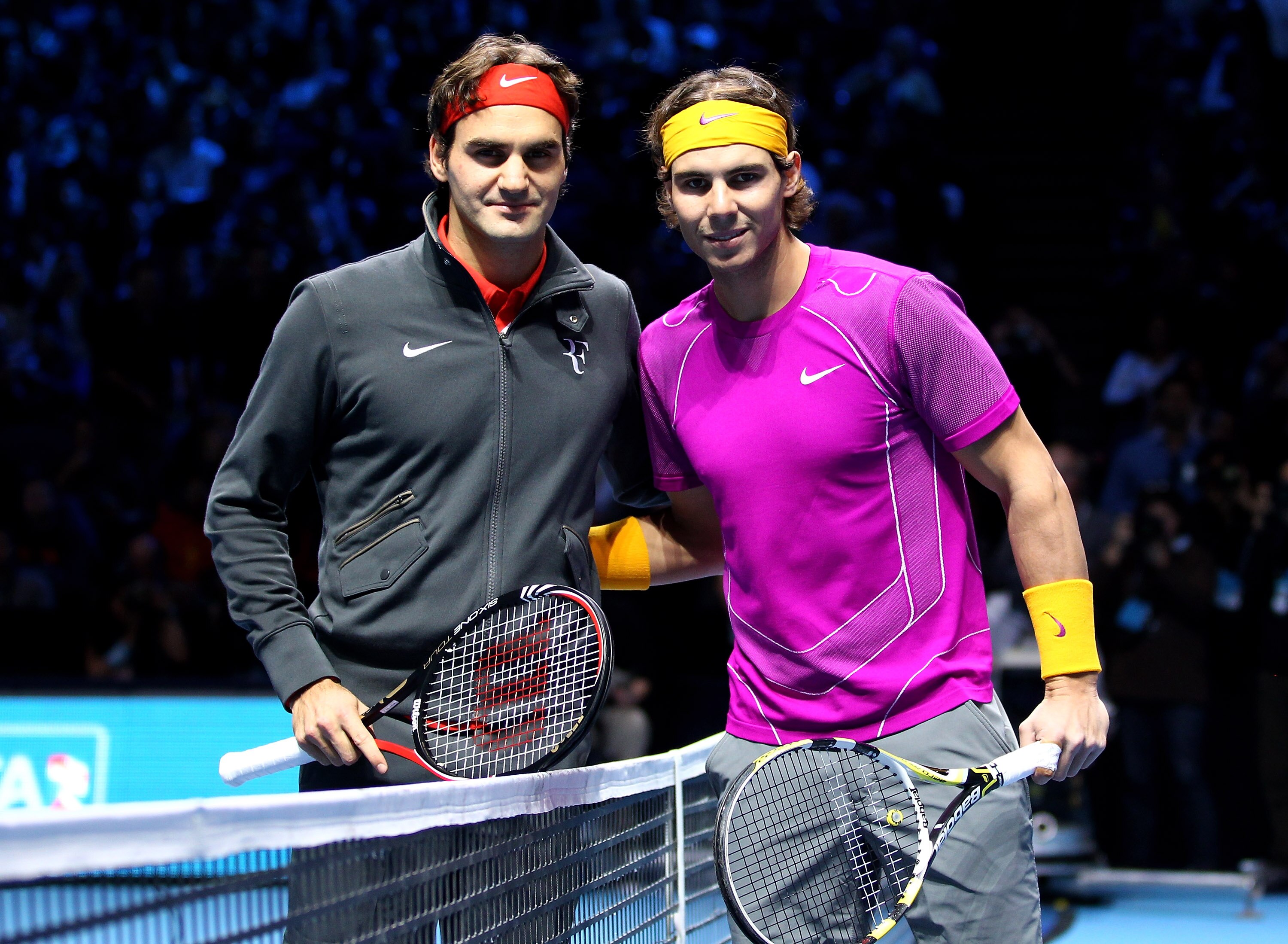LONDON, ENGLAND - NOVEMBER 28:  Roger Federer of Switzerland (L) and Rafael Nadal of Spain (R) pose on court before their men's final during the ATP World Tour Finals at O2 Arena on November 28, 2010 in London, England.  (Photo by Julian Finney/Getty Imag