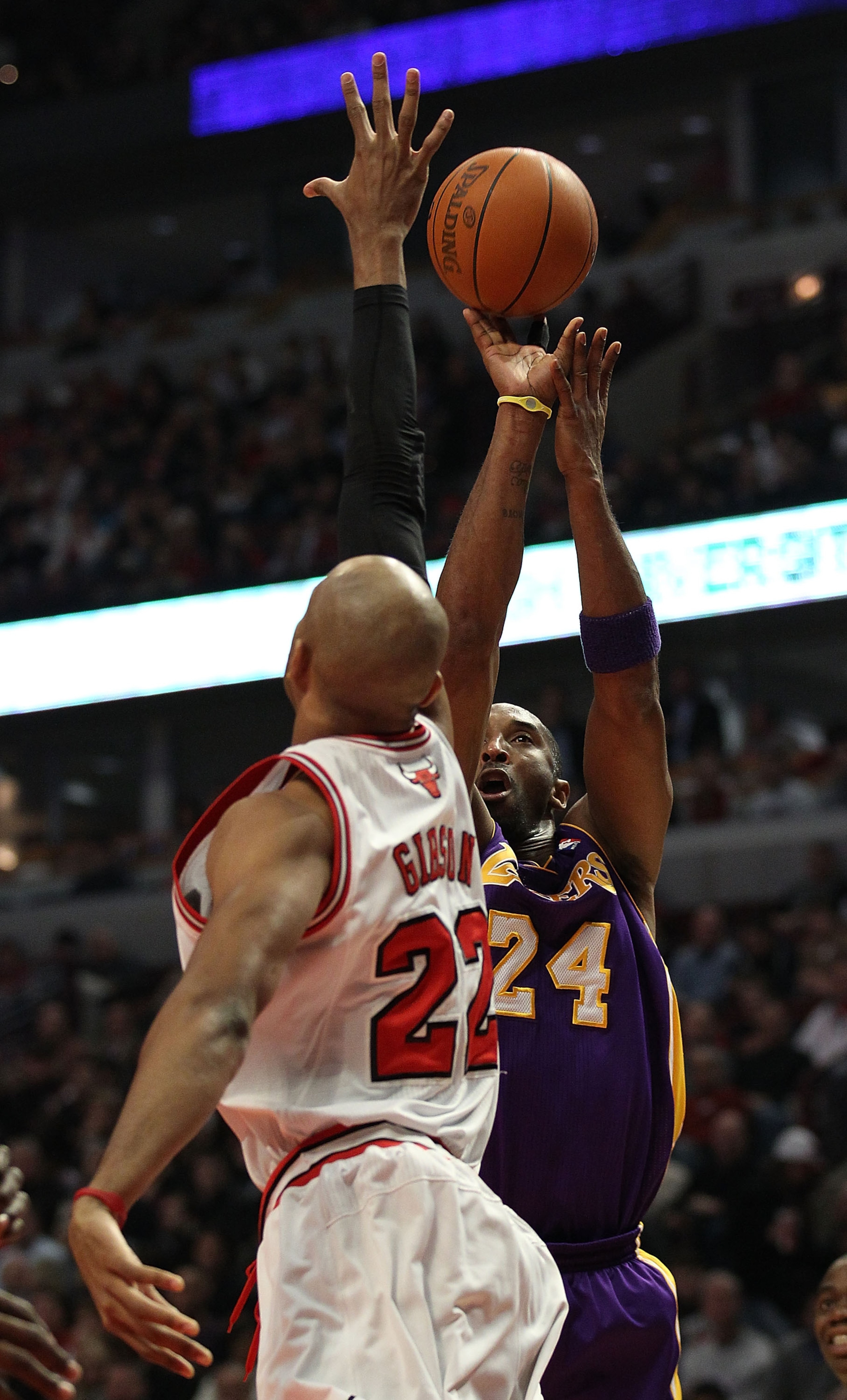 CHICAGO, IL - DECEMBER 10: Kobe Bryant #24 of the Los Angeles Lakers puts up a shot over Taj Gibson #22 of the Chicago Bulls at the United Center on December 10, 2010 in Chicago, Illinois. The Bulls defeated the Lakers 88-84. NOTE TO USER: User expressly 
