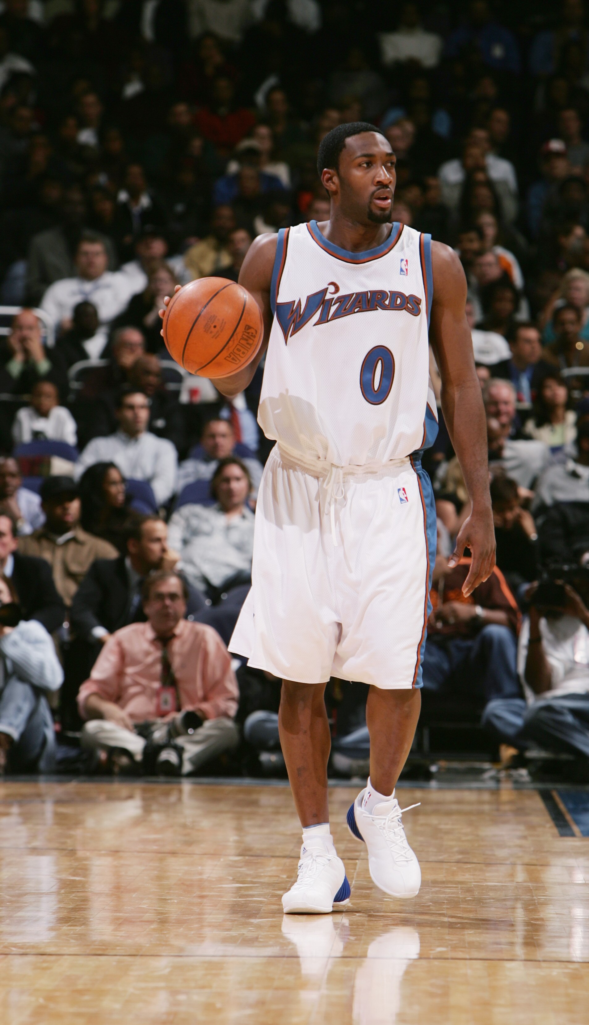 WAHINGTON - NOVEMBER 10:  Gilbert Arenas #0 of the Washington Wizards brings the ball upcourt during the game against the Orlando Magic on November 10, 2004 at the MCI Center in Washington D.C.  The Wizards won 106-96. NOTE TO USER:  User expressly acknow