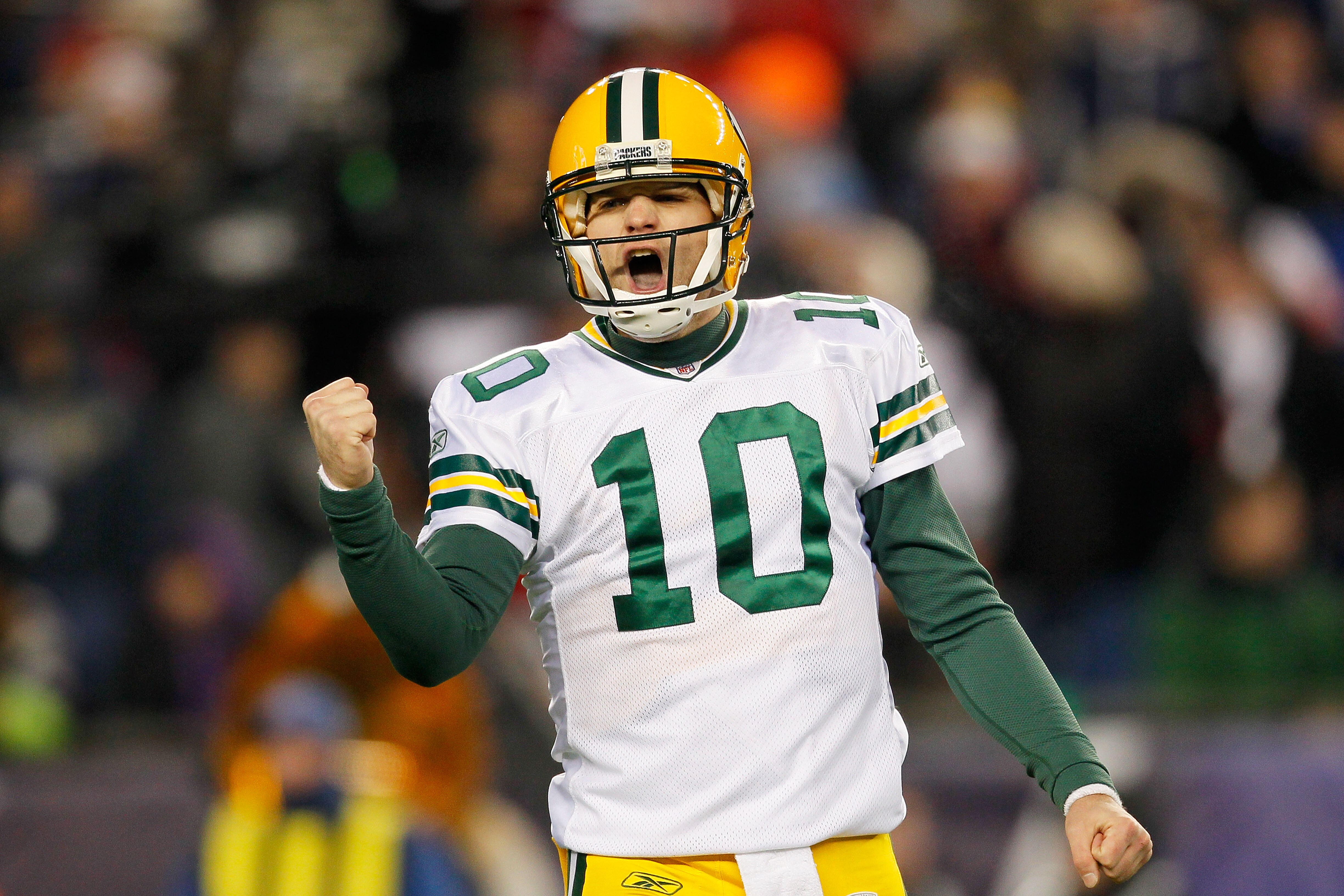 FOXBORO, MA - DECEMBER 19:  Quarterback Matt Flynn #10 of the Green Bay Packers celebrates a touchdown during the second quarter of the game against the New England Patriots at Gillette Stadium on December 19, 2010 in Foxboro, Massachusetts.  (Photo by Ji