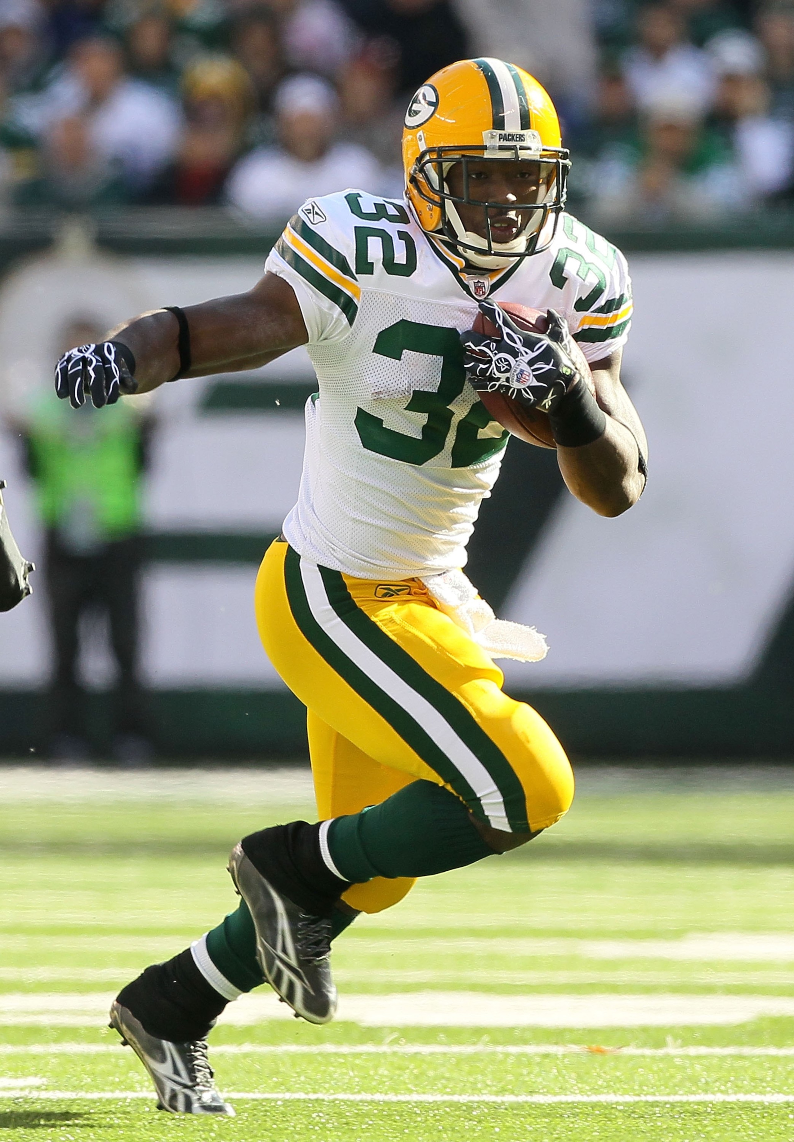 EAST RUTHERFORD, NJ - OCTOBER 31:  Brandon Jackson #32 of the Green Bay Packers runs the ball against the New York Jets on October 31, 2010 at the New Meadowlands Stadium in East Rutherford, New Jersey.  (Photo by Jim McIsaac/Getty Images)