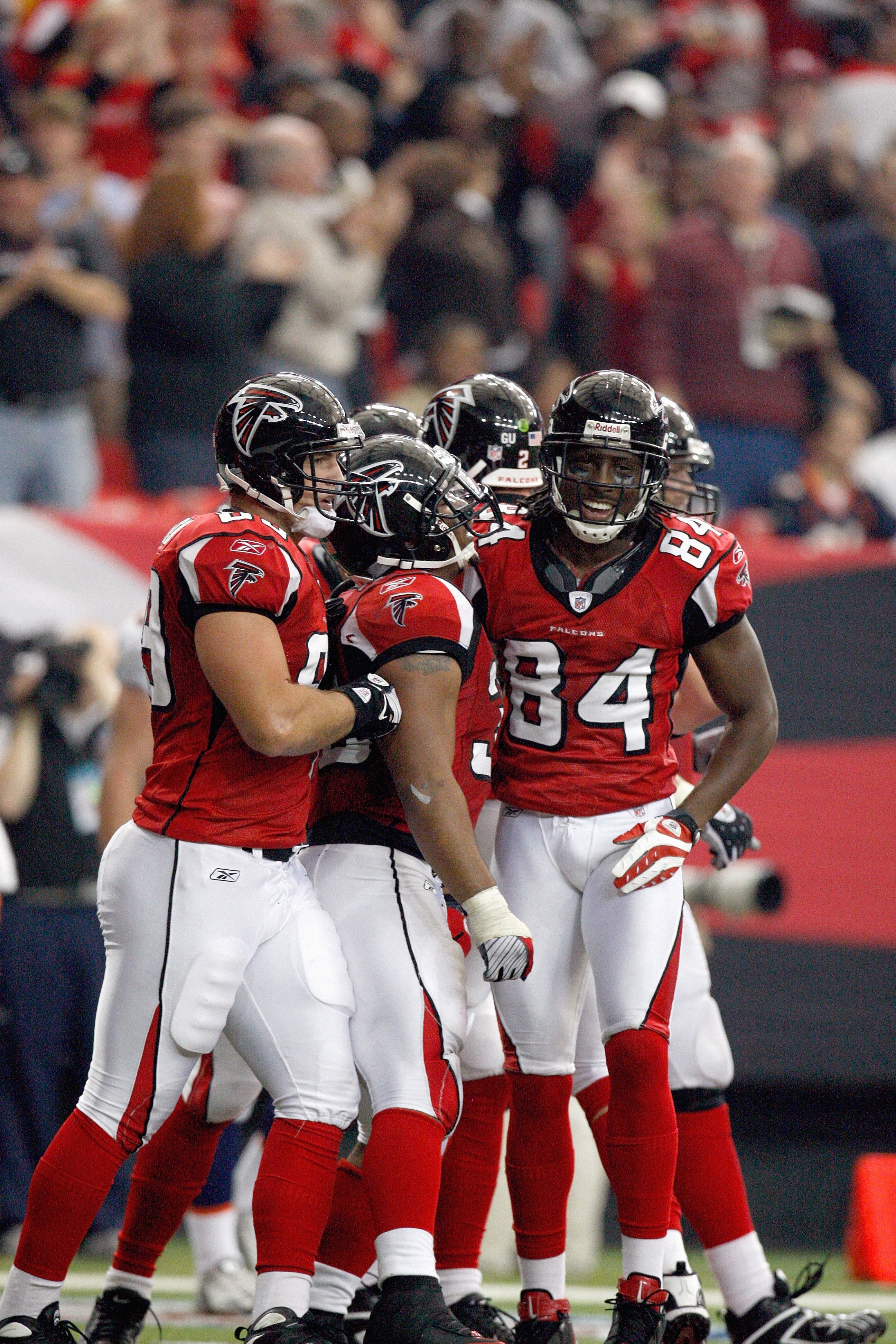ATLANTA - NOVEMBER 16:  Roddy White #84 of the Atlanta Falcons celebrates Michael Turner's touchdown during the game against the Denver Broncos at the Georgia Dome on November 16, 2008 in Atlanta, Georgia.  (Photo by Kevin C. Cox/Getty Images)
