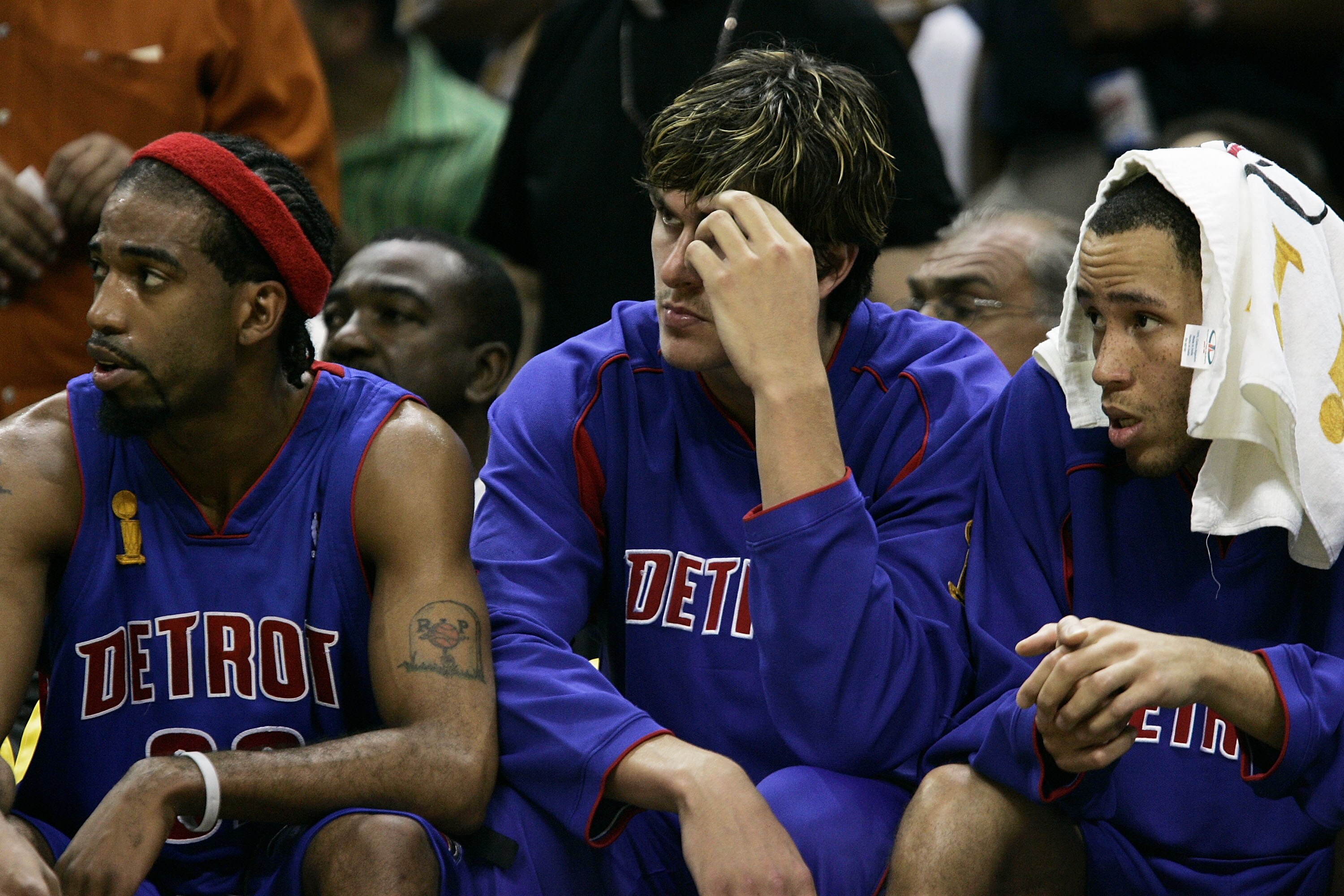 SAN ANTONIO - JUNE 12: (L to R) Richard Hamilton #32, Darko Milicic #31 and Teyshaun Prince #22 of the Detroit Pistons watch the game in the second quarter from the bench against the San Antonio Spurs in Game two of the 2005 NBA Finals on June 12, 2005 at