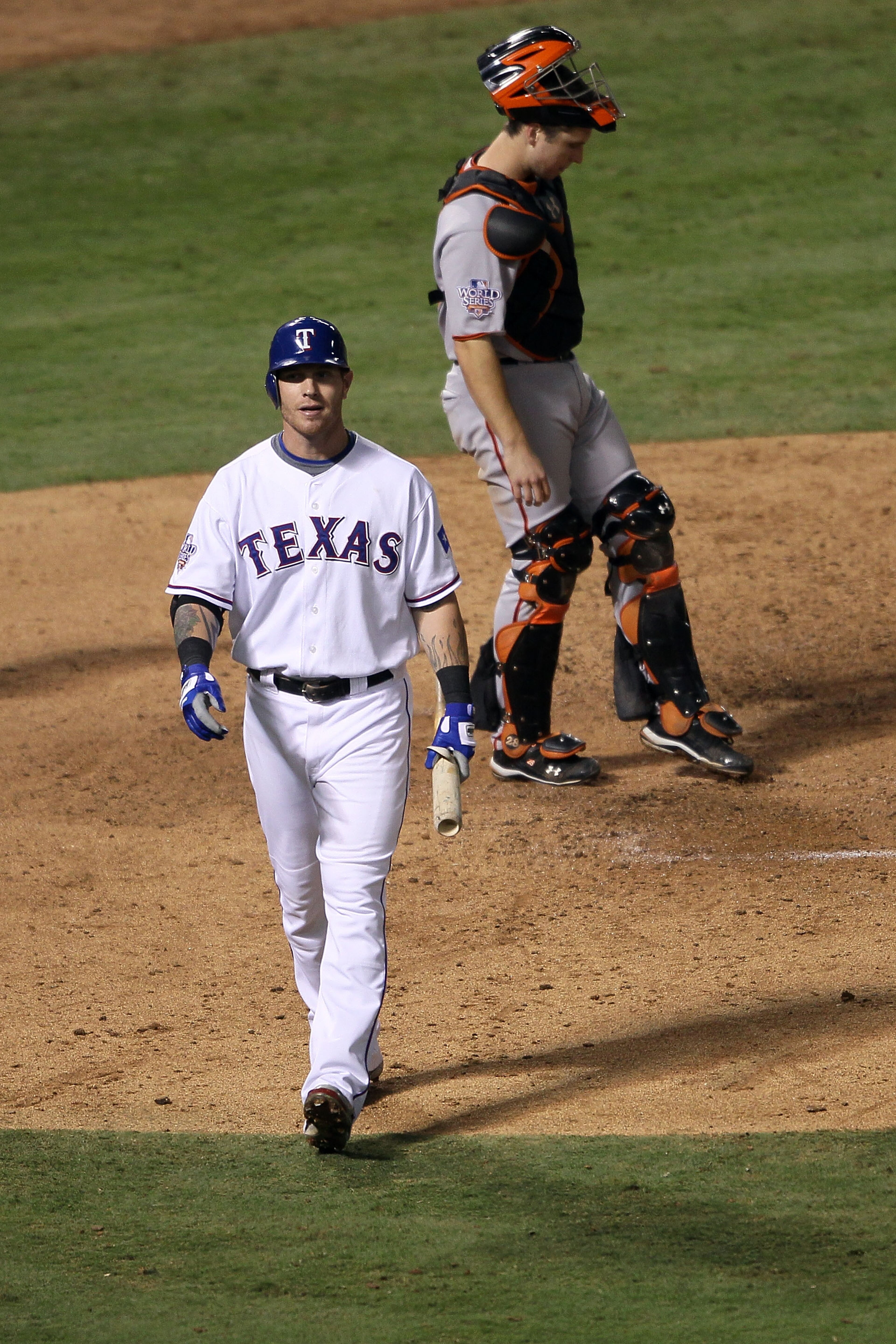ARLINGTON, TX - NOVEMBER 01:  Josh Hamilton #32 of the Texas Rangers reacts after he struck out in the ninth inning against catcher Buster Posey #28 of the San Francisco Giants in Game Five of the 2010 MLB World Series at Rangers Ballpark in Arlington on