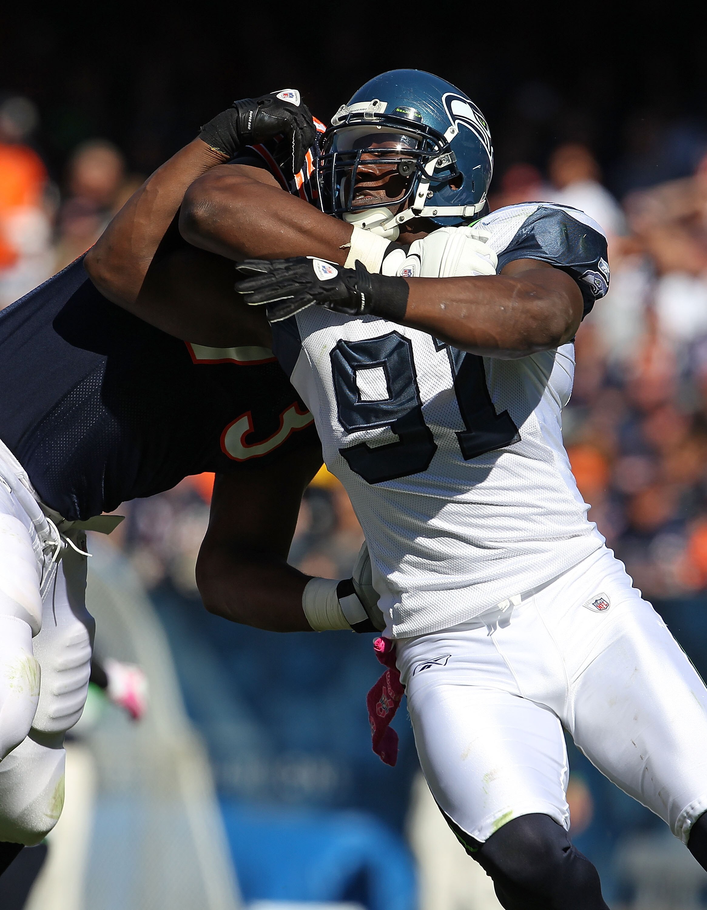 CHICAGO - OCTOBER 17: Chris Clemons #91 of the Seattle Seahawks rushes against J'Marcus Webb #73 of the Chicago Bears at Soldier Field on October 17, 2010 in Chicago, Illinois. The Seahawks defeated the Bears 23-20. (Photo by Jonathan Daniel/Getty Images)