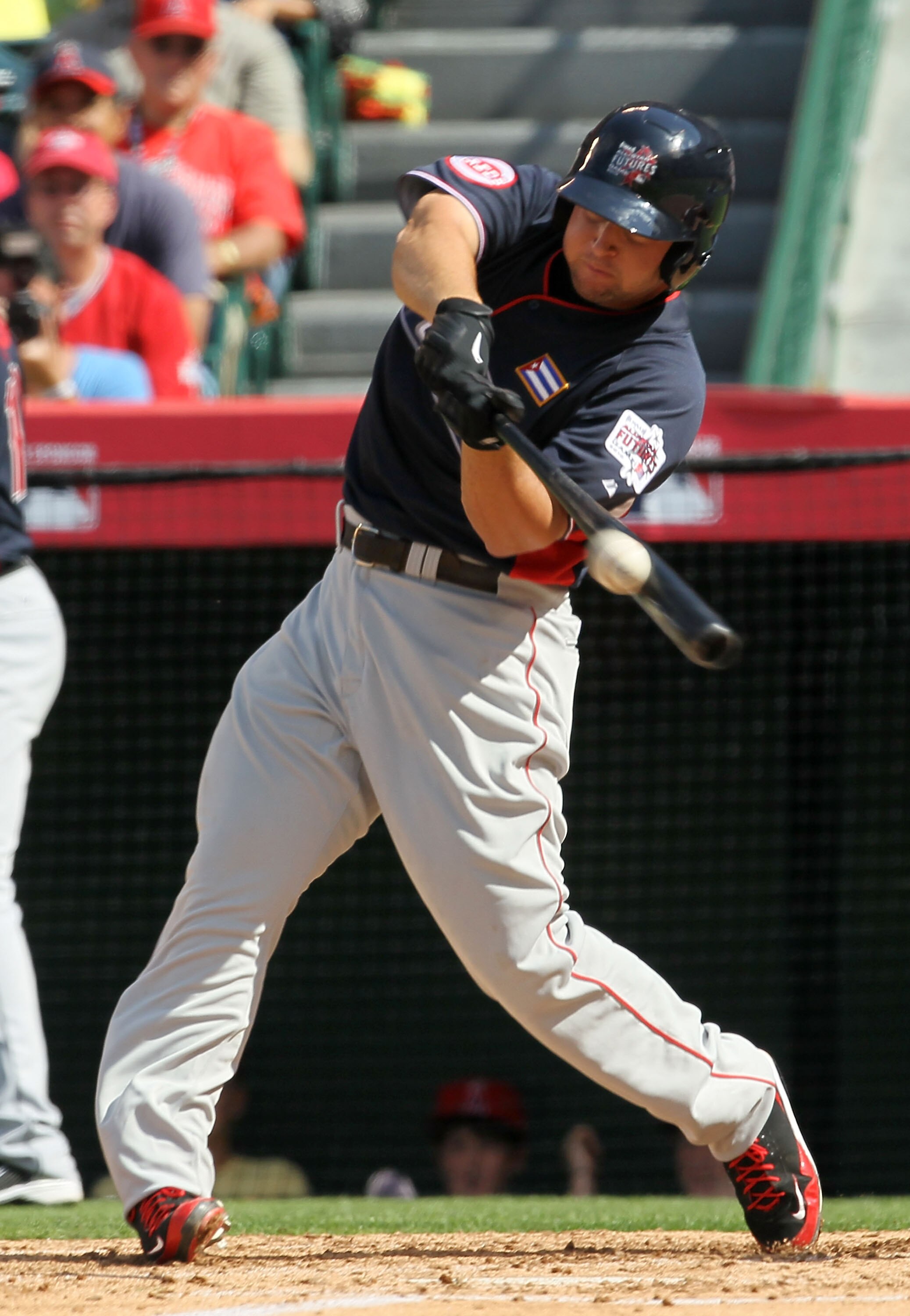 ANAHEIM, CA - JULY 11:  World Futures All-Star Yonder Alonso #20 of the Cincinnati Reds flys out to end the third during the 2010 XM All-Star Futures Game at Angel Stadium of Anaheim on July 11, 2010 in Anaheim, California.  (Photo by Stephen Dunn/Getty I