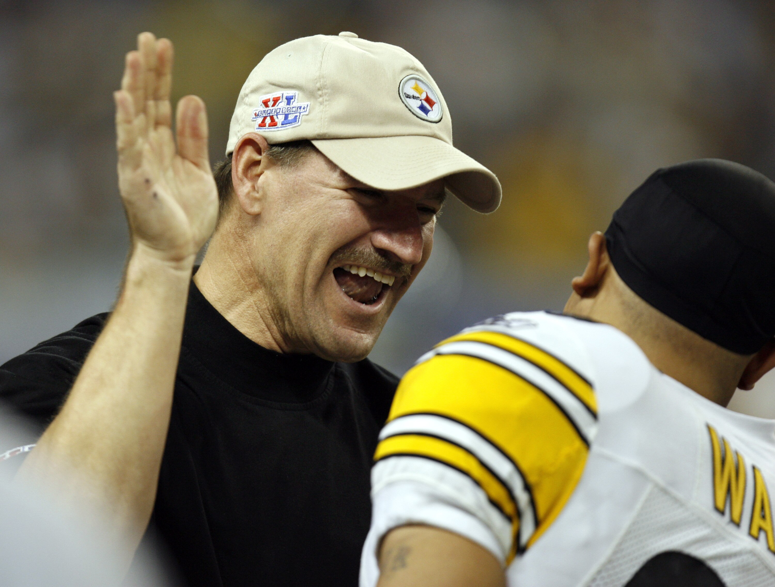 Pittsburgh Steelers coach Bill Cower and Hines Ward after the Steelers beat the Seattle Seahawks 21-10 in the NFL's Super Bowl XL in Detroit, Michigan February 5, 2006. (Photo by Allen Kee/Getty Images)