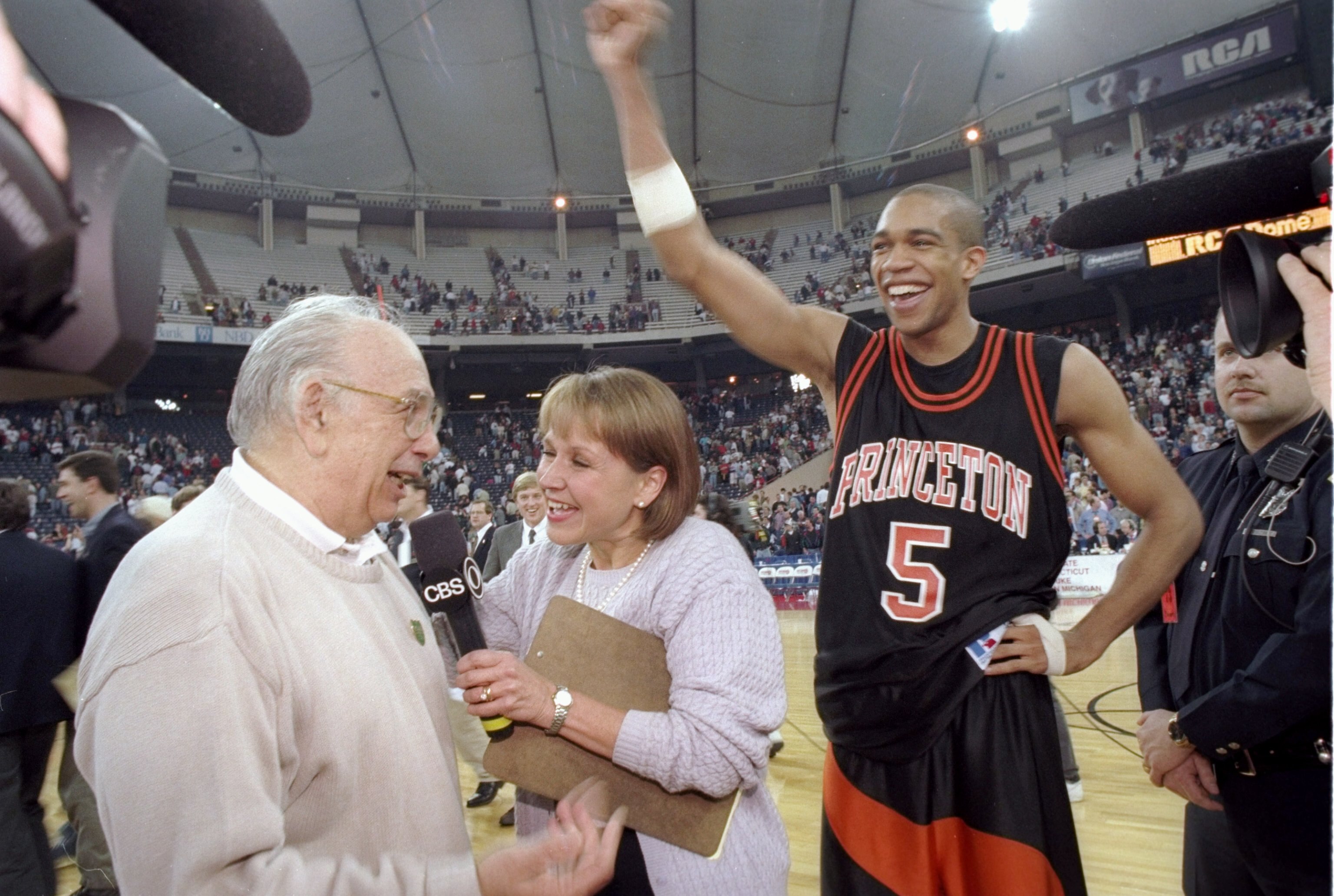 14 Mar 1996:  Guard Sydney Johnson and coach Pete Carril of the Princeton Tigers celebrate after a game against the UCLA Bruins at the RCA Dome in Indianapolis, Indiana.  Princeton won the game, 43-41. Mandatory Credit: Jamie Squire  /Allsport