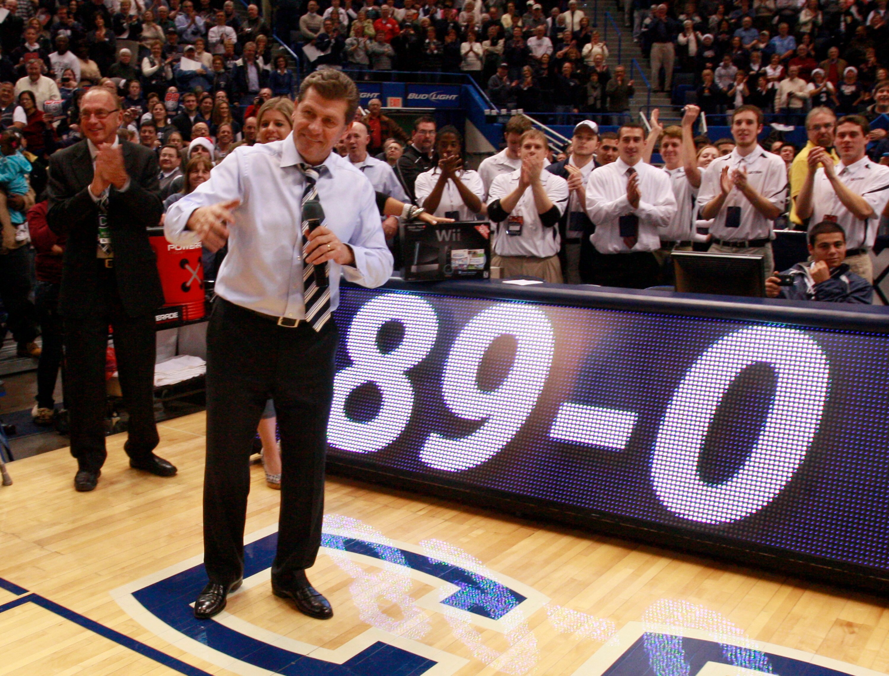 HARTFORD, CT - DECEMBER 21:  Coach Geno Auriemma of Connecticut celebrates a win over  Florida State on December 21, 2010 in Hartford, Connecticut.  Connecticut set a record with 89 straight wins without a defeat. (Photo by Jim Rogash/Getty Images)