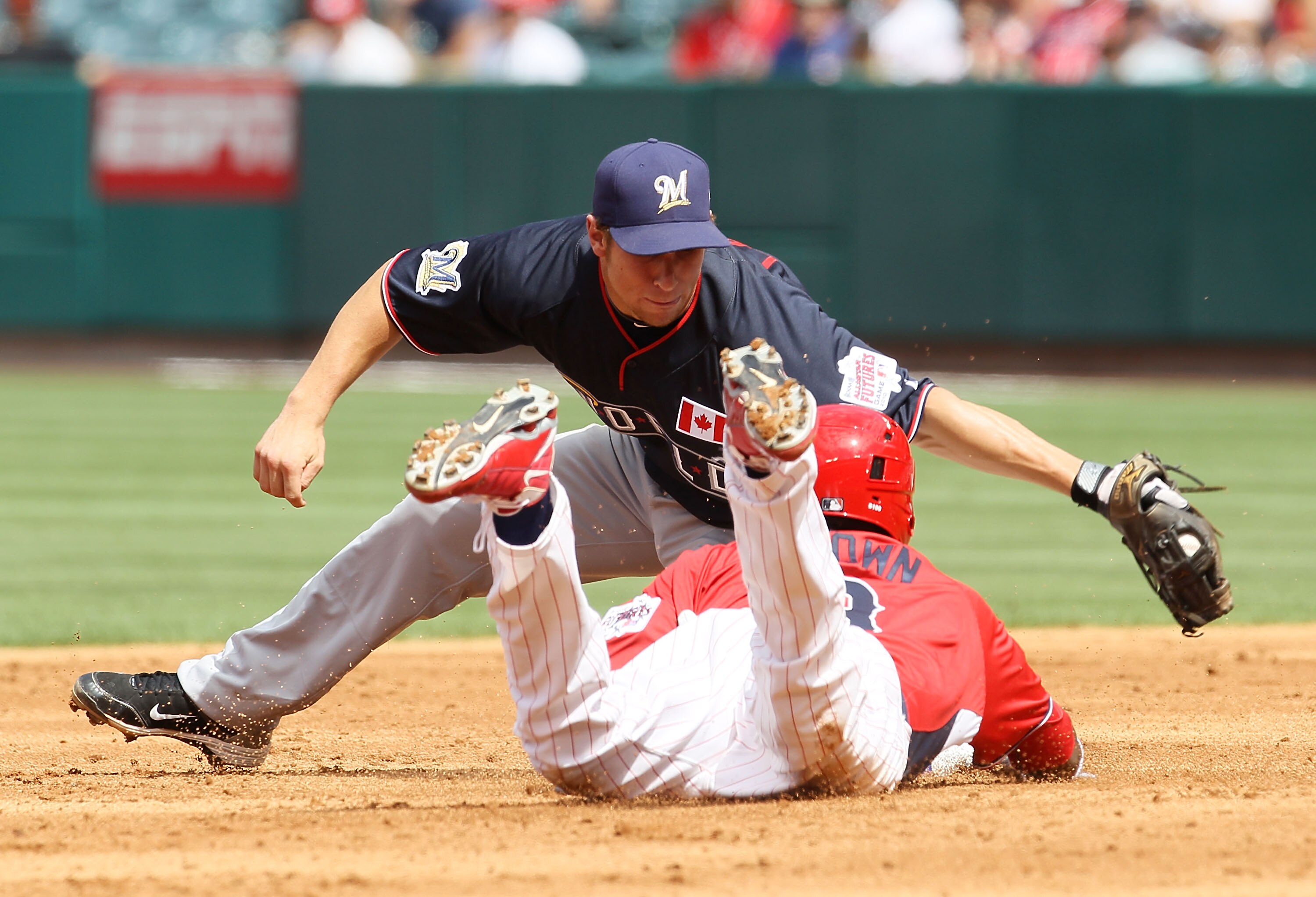 ANAHEIM, CA - JULY 11:  U.S. Futures All-Star Domonic Brown #3 of the Philadelphia Phillies slides into second base safely during the 2010 XM All-Star Futures Game at Angel Stadium of Anaheim on July 11, 2010 in Anaheim, California.  (Photo by Stephen Dun