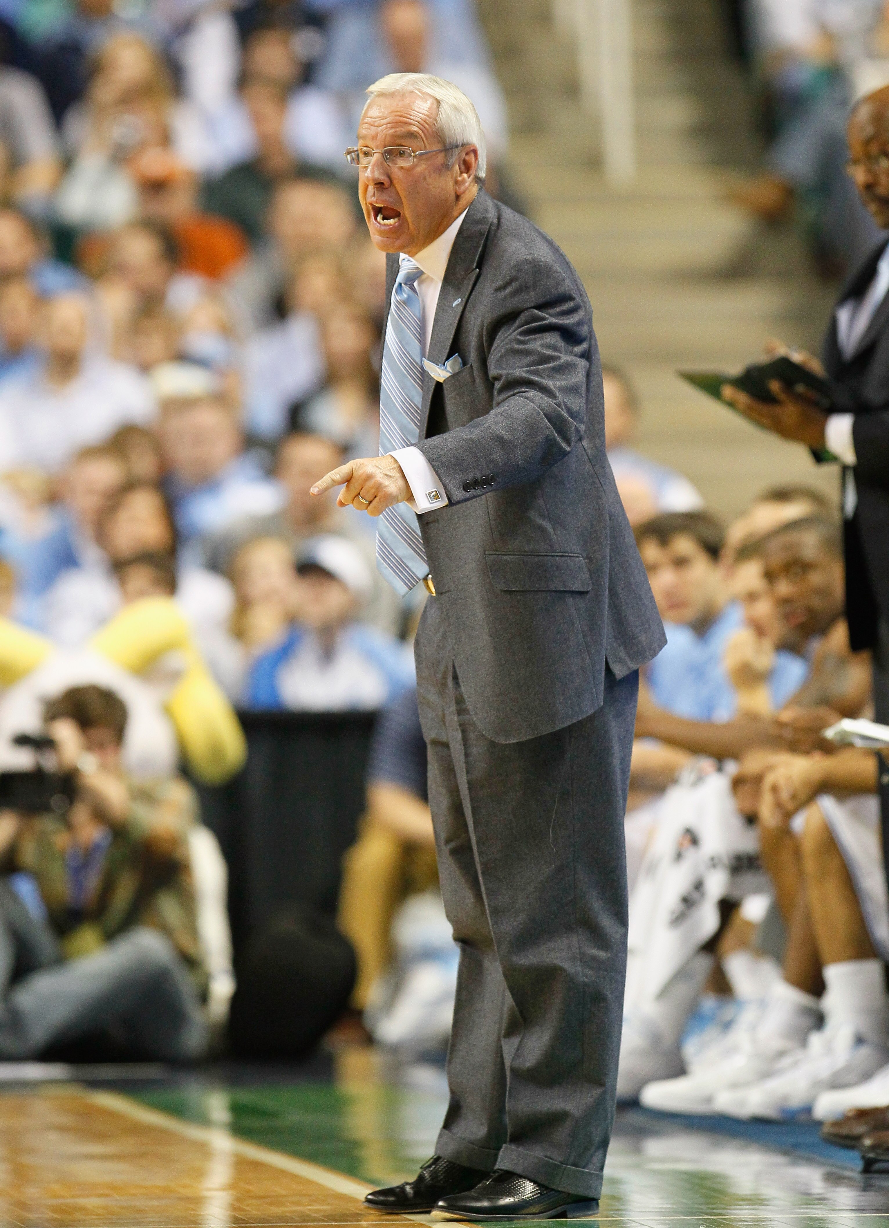 GREENSBORO, NC - DECEMBER 18:  Head coach Roy Williams of the North Carolina Tar Heels yells to an official during the game against the Texas Longhorns at Greensboro Coliseum on December 18, 2010 in Greensboro, North Carolina.  (Photo by Kevin C. Cox/Gett