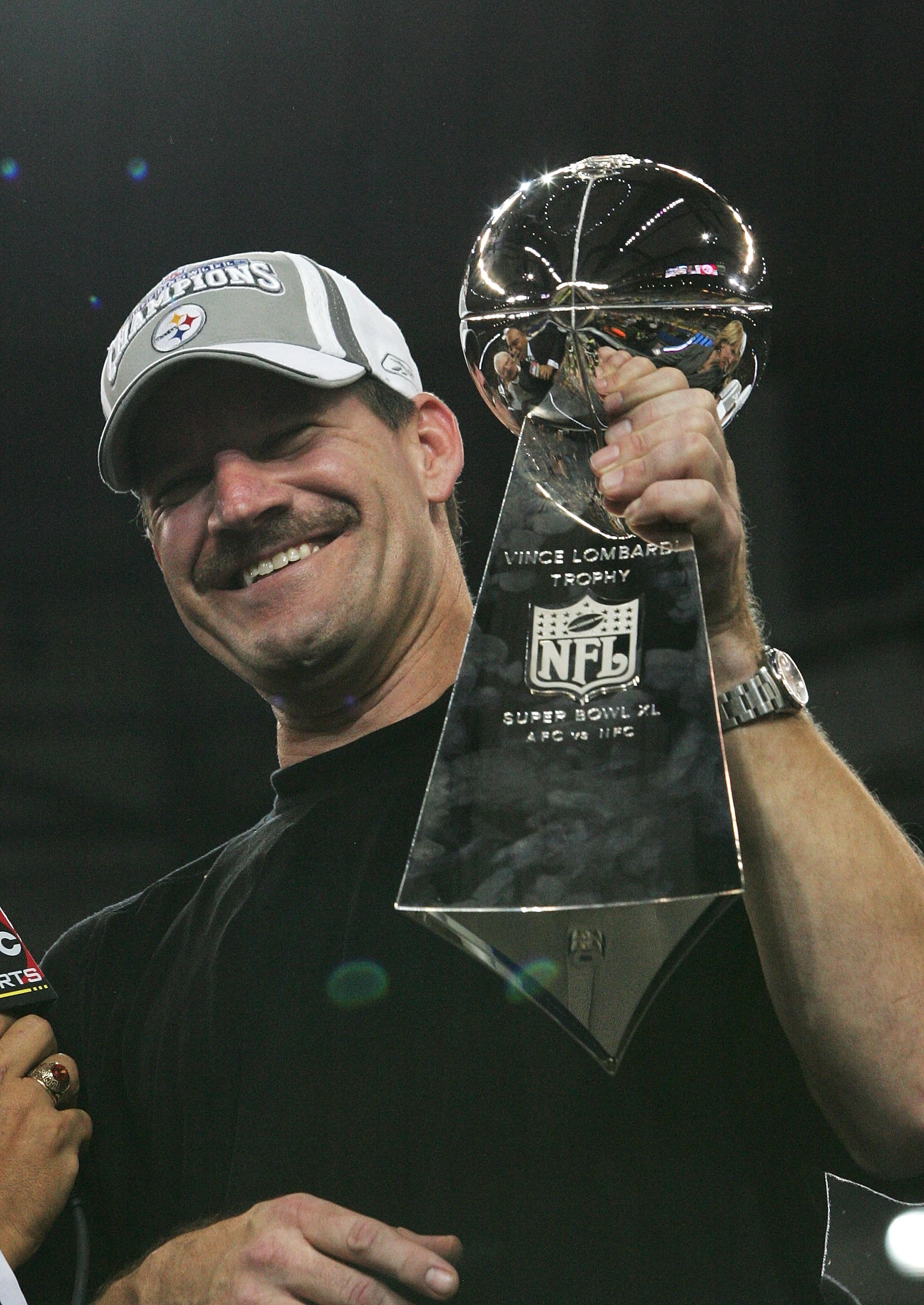 DETROIT - FEBRUARY 05:  Head coach Bill Cowher of the Pittsburgh Steelers celebrates with the Vince Lombardi Tropy after defeating the Seattle Seahawks in Super Bowl XL at Ford Field on February 5, 2006 in Detroit, Michigan.The Steelers defeated the Seaha