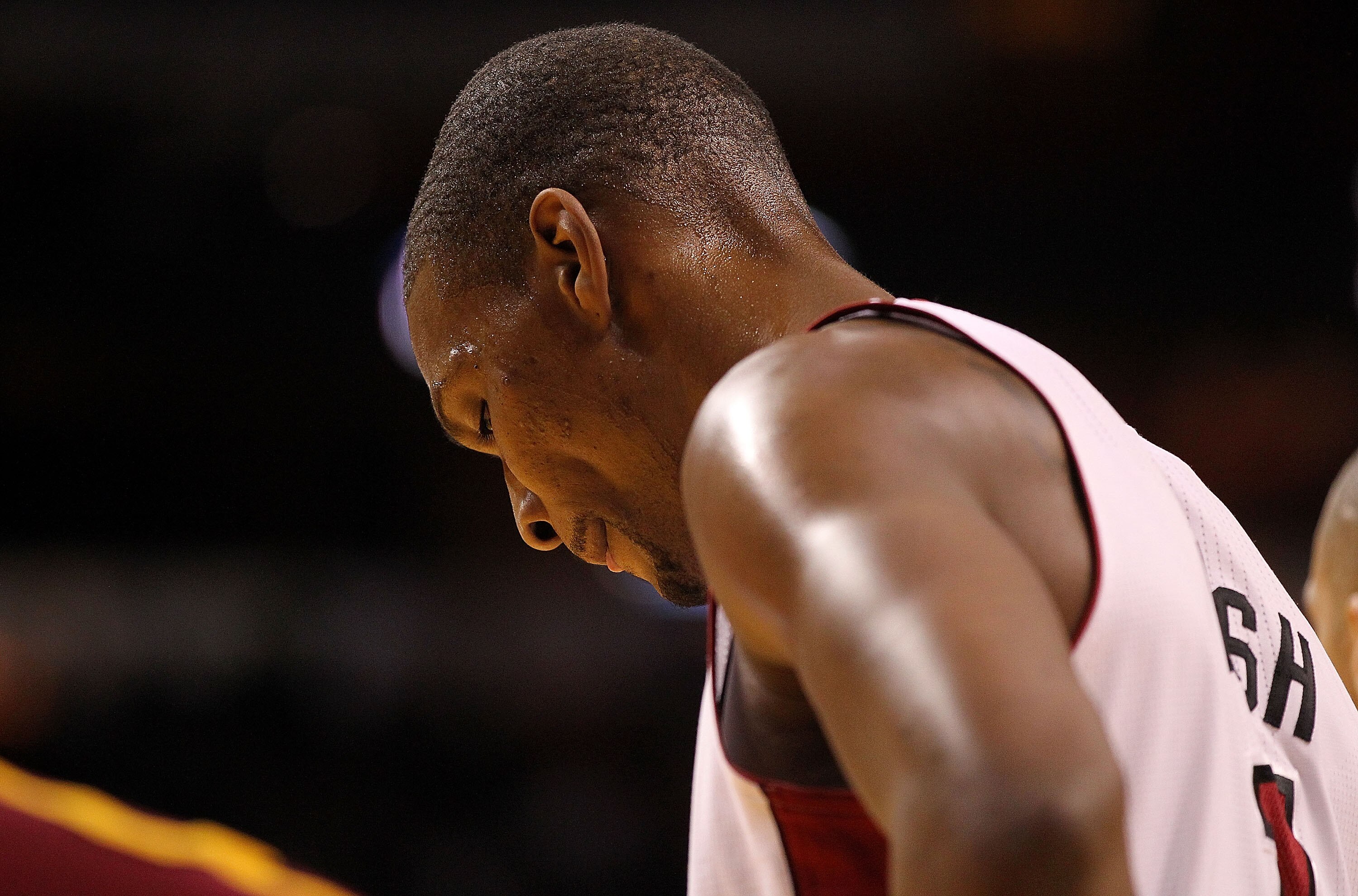 MIAMI, FL - DECEMBER 15:  Chris Bosh #1 of the Miami Heat watches a foul shot during a game against the Cleveland Cavaliers at American Airlines Arena on December 15, 2010 in Miami, Florida. NOTE TO USER: User expressly acknowledges and agrees that, by do