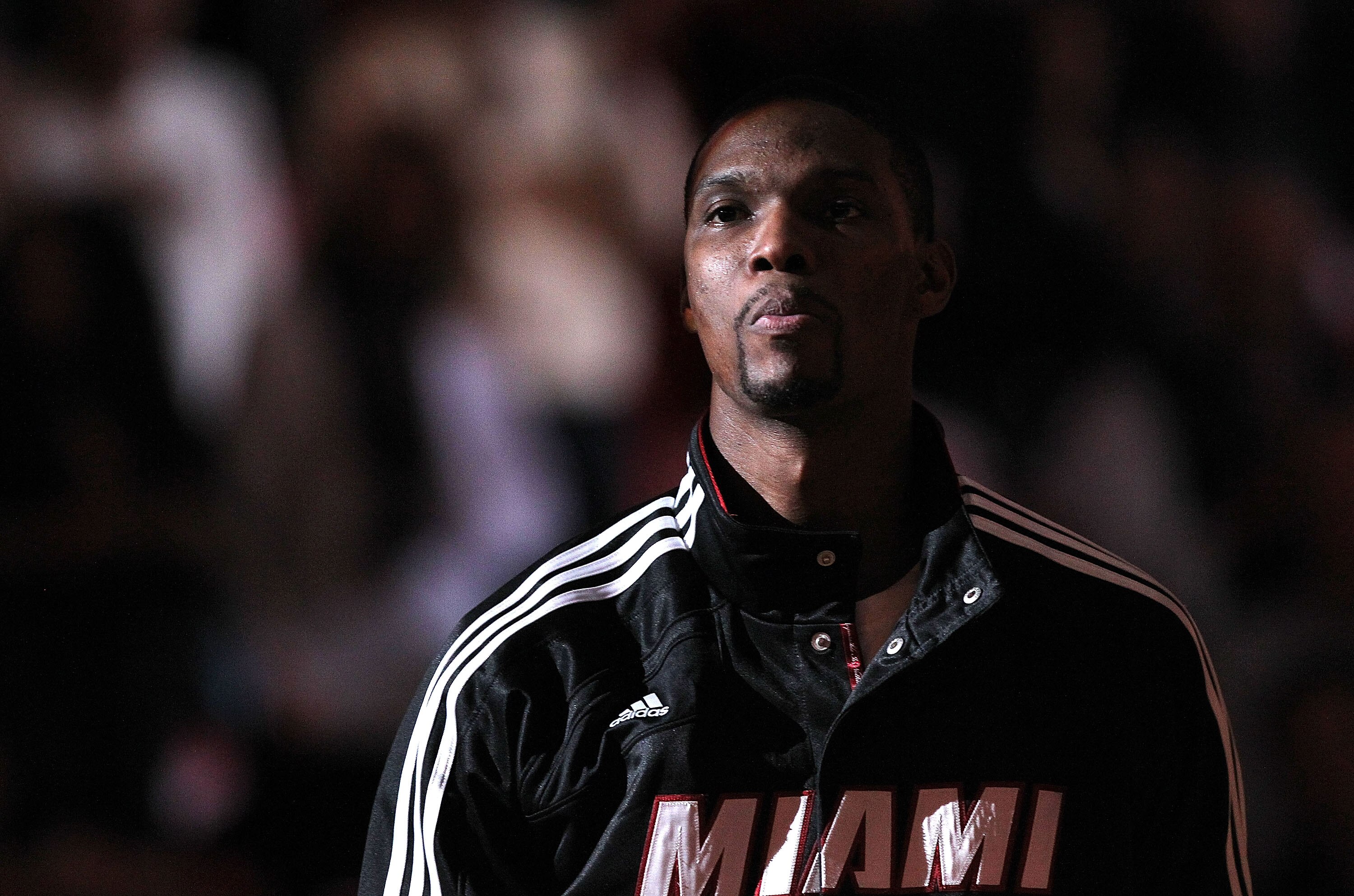 MIAMI, FL - DECEMBER 13: Chris Bosh #1 of the Miami Heat looks on during a game against the New Orleans Hornets at American Airlines Arena on December 13, 2010 in Miami, Florida. NOTE TO USER: User expressly acknowledges and agrees that, by downloading an