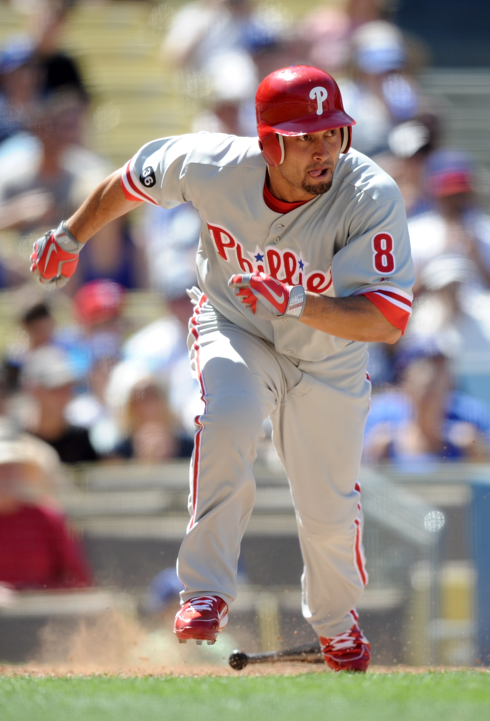 LOS ANGELES, CA - SEPTEMBER 01:  Shane Victorino #8 of the Philadelphia Phillies runs to first base against the Los Angeles Dodgers at Dodger Stadium on September 1, 2010 in Los Angeles, California.  (Photo by Harry How/Getty Images)